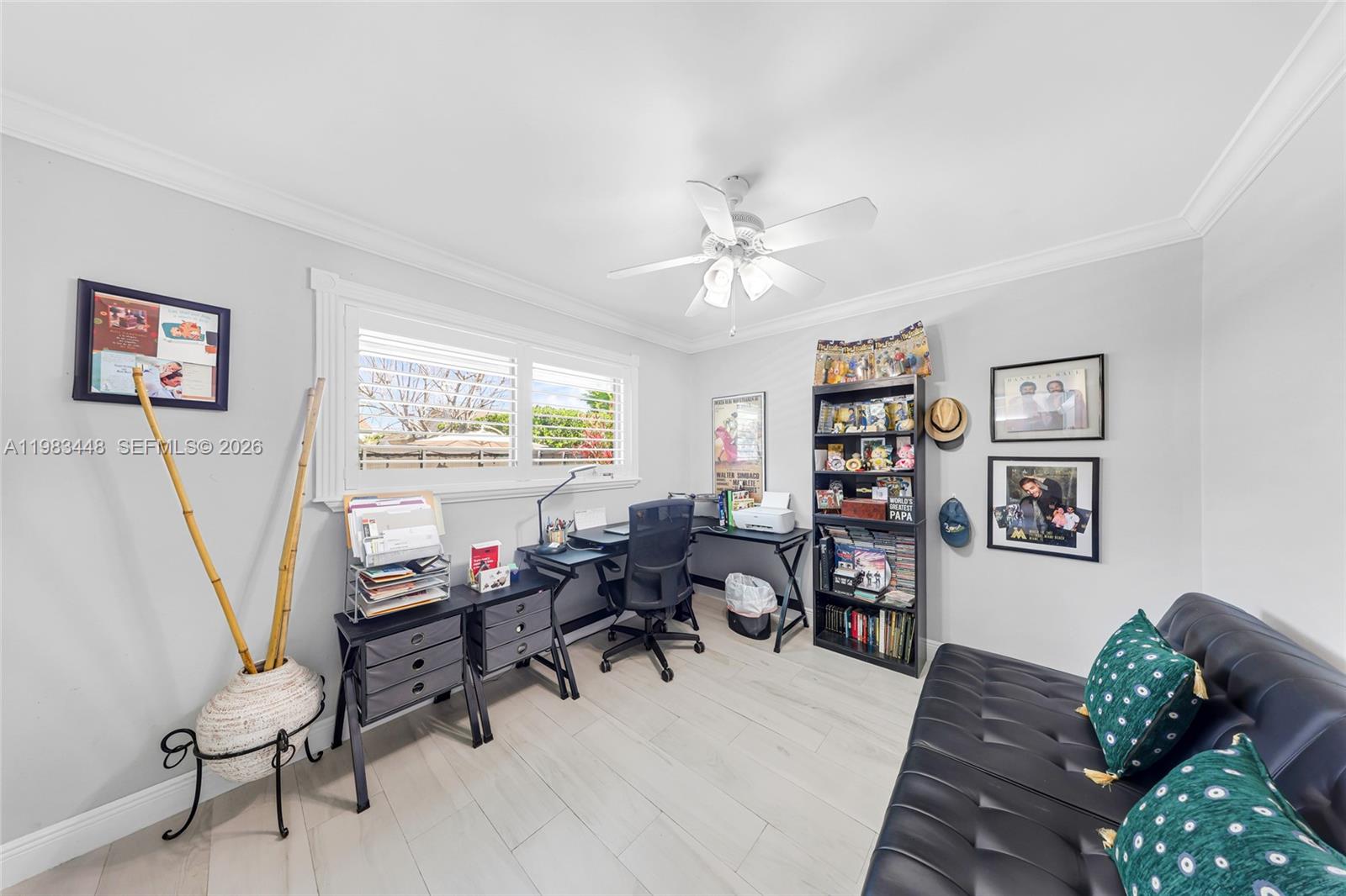 13951 Southwest 109th Street Miami, FL 33186 - Photo 15 of 34 a view of a livingroom with workspace and a couch