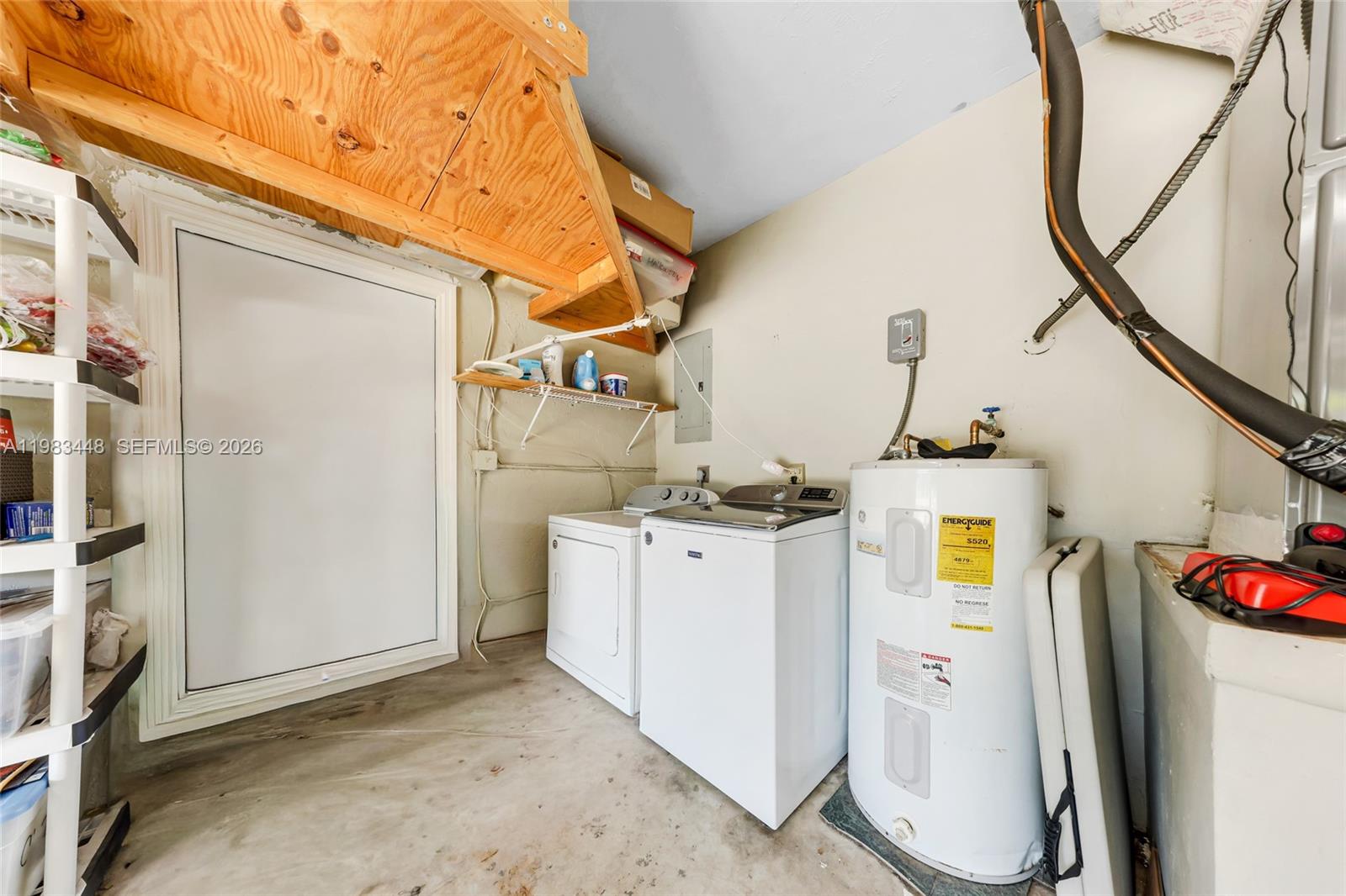 13951 Southwest 109th Street Miami, FL 33186 - Photo 27 of 34 a utility room with dryer and washer