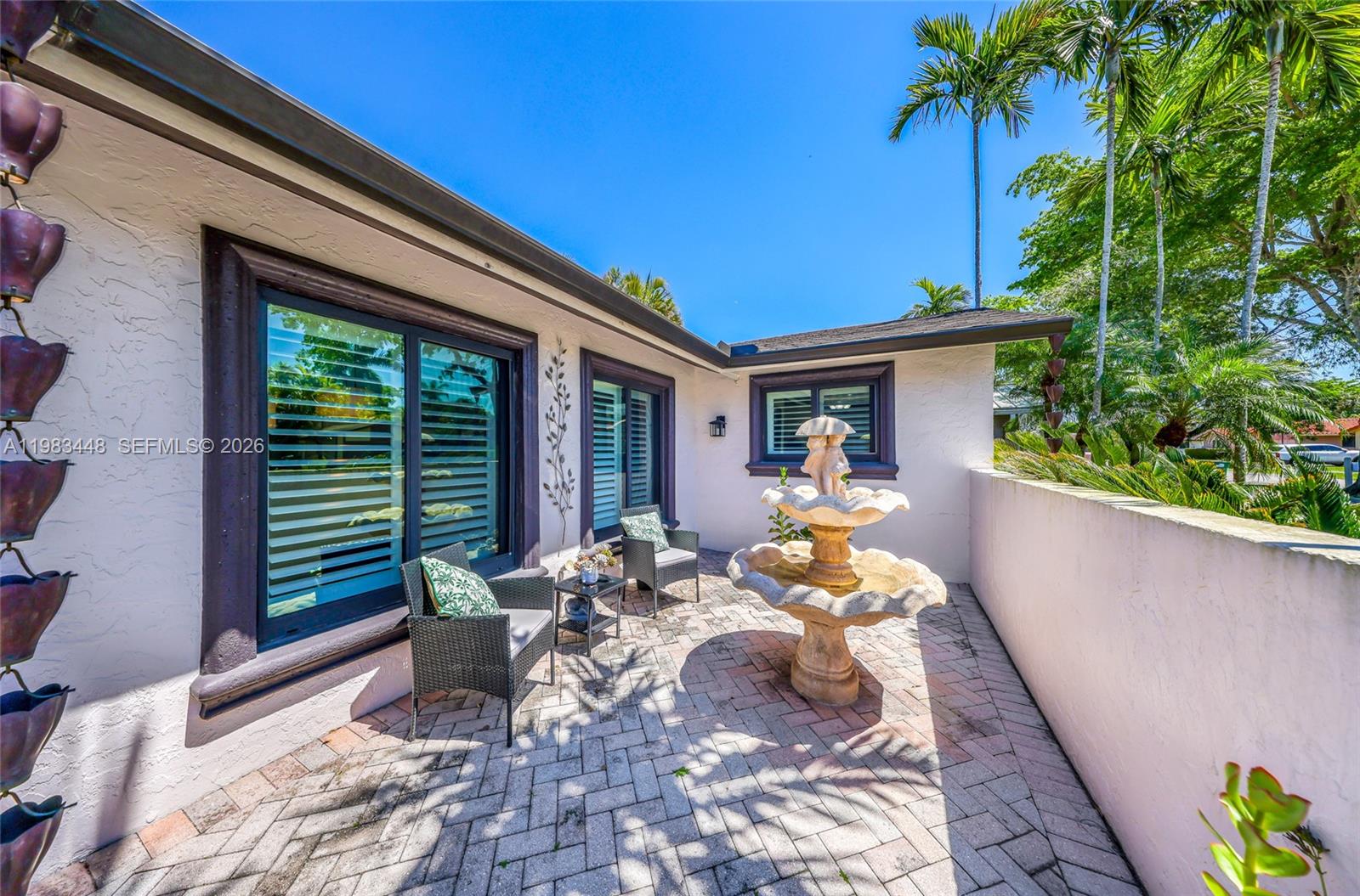 13951 Southwest 109th Street Miami, FL 33186 - Photo 34 of 34 a front view of a house with patio