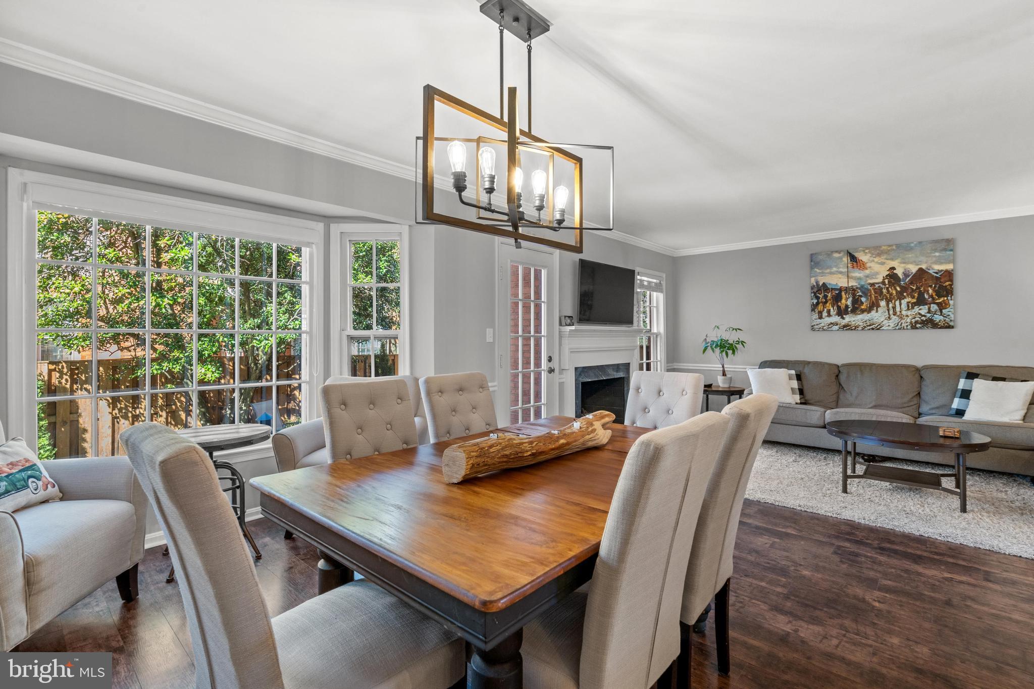 1796 Duffield Lane Alexandria, VA 22307 - Photo 14 of 42 a view of a dining room with furniture window and wooden floor