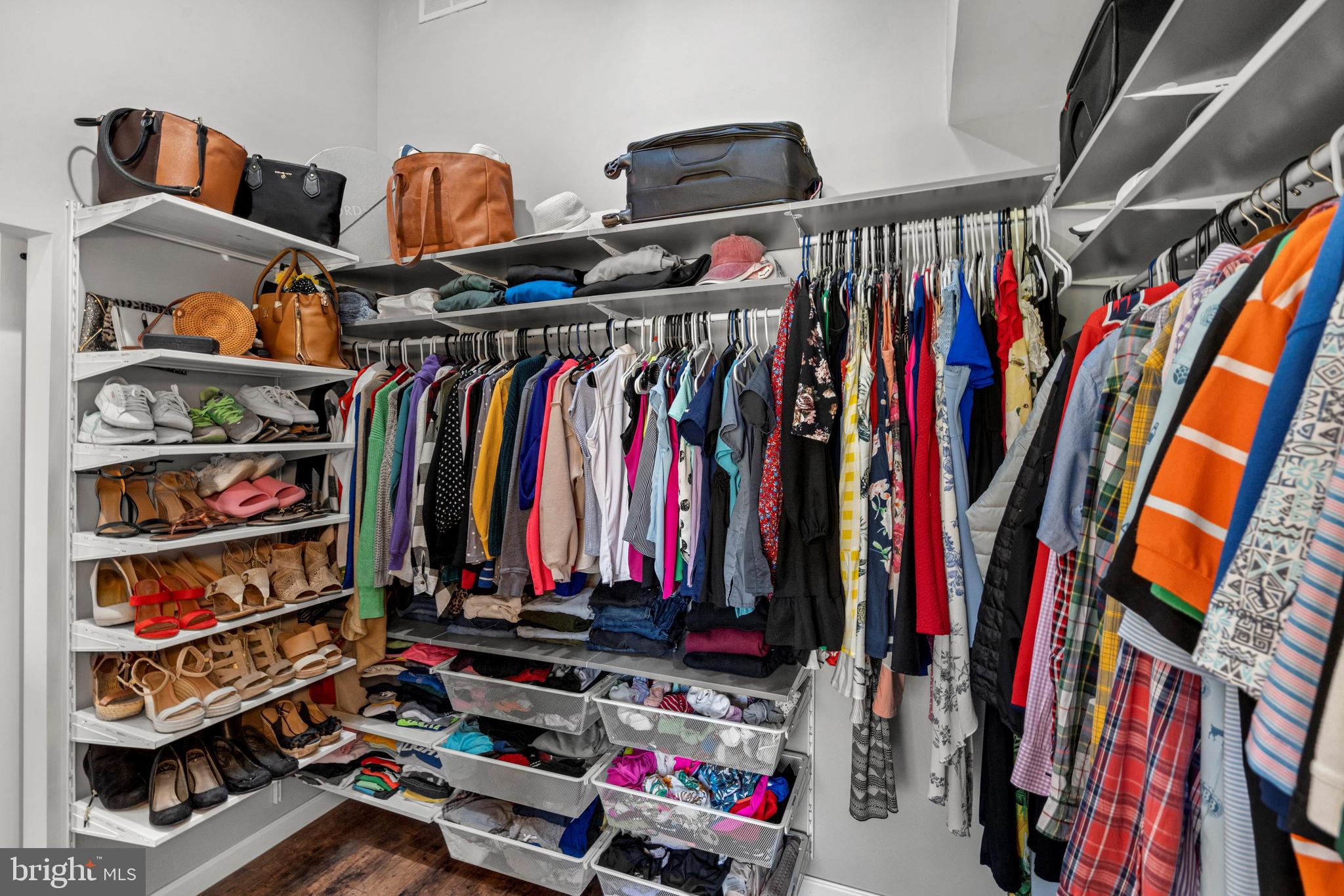 1796 Duffield Lane Alexandria, VA 22307 - Photo 22 of 42 a view of walk in closet with clothes and shoes