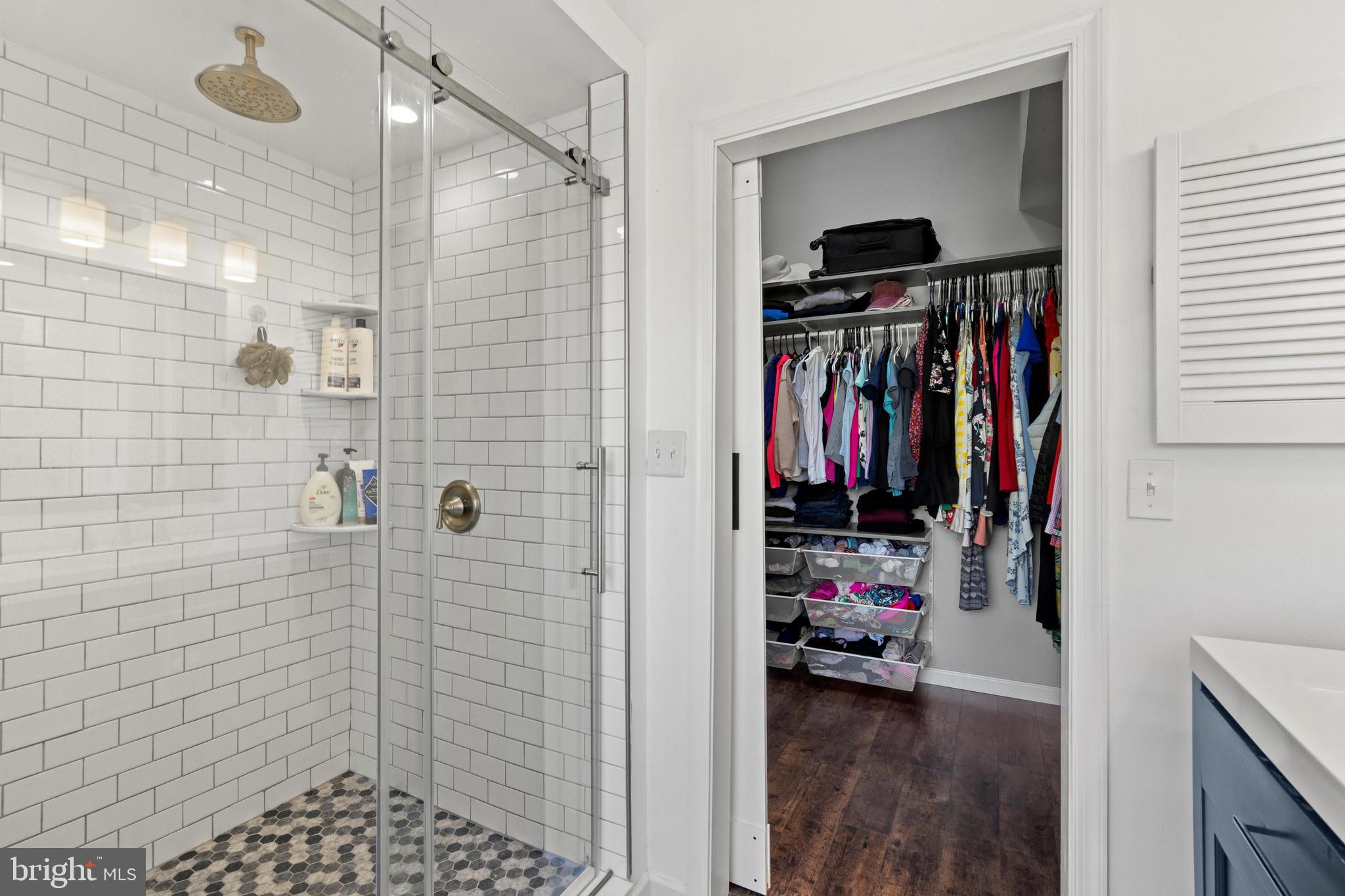 1796 Duffield Lane Alexandria, VA 22307 - Photo 23 of 42 a view of a walk in closet and bathroom