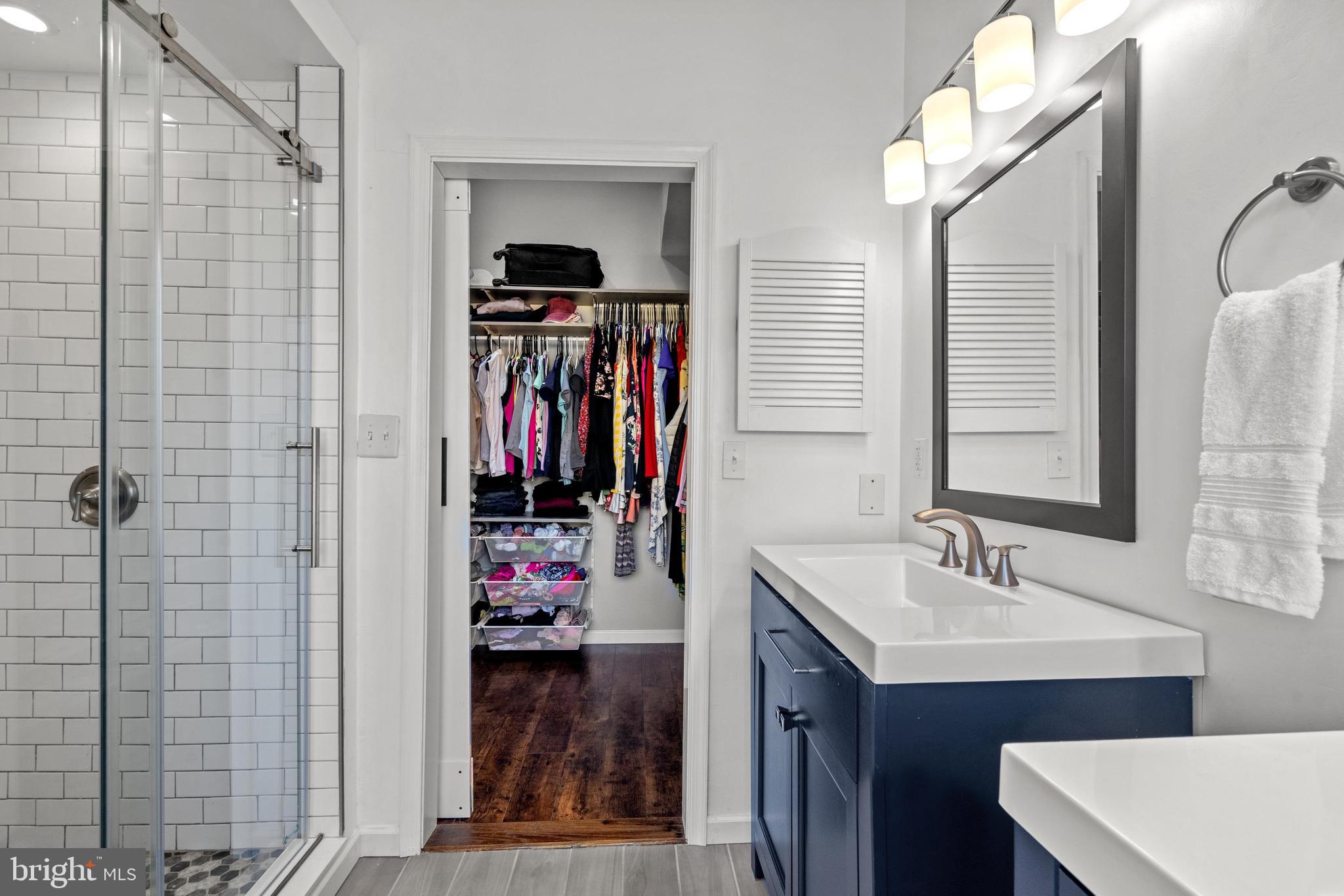 1796 Duffield Lane Alexandria, VA 22307 - Photo 24 of 42 a bathroom with a sink and a mirror
