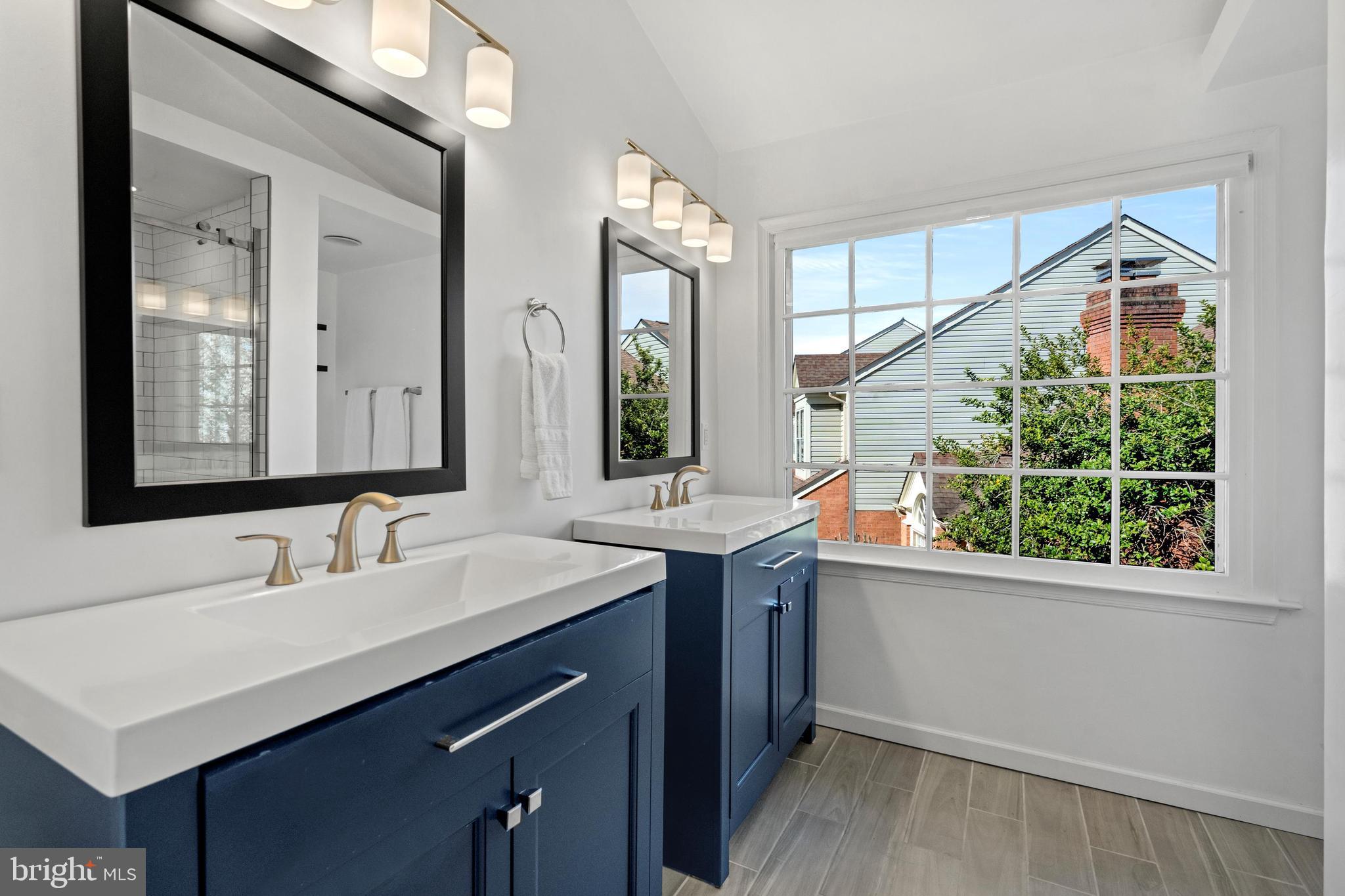 1796 Duffield Lane Alexandria, VA 22307 - Photo 25 of 42 a bathroom with a sink and a mirror