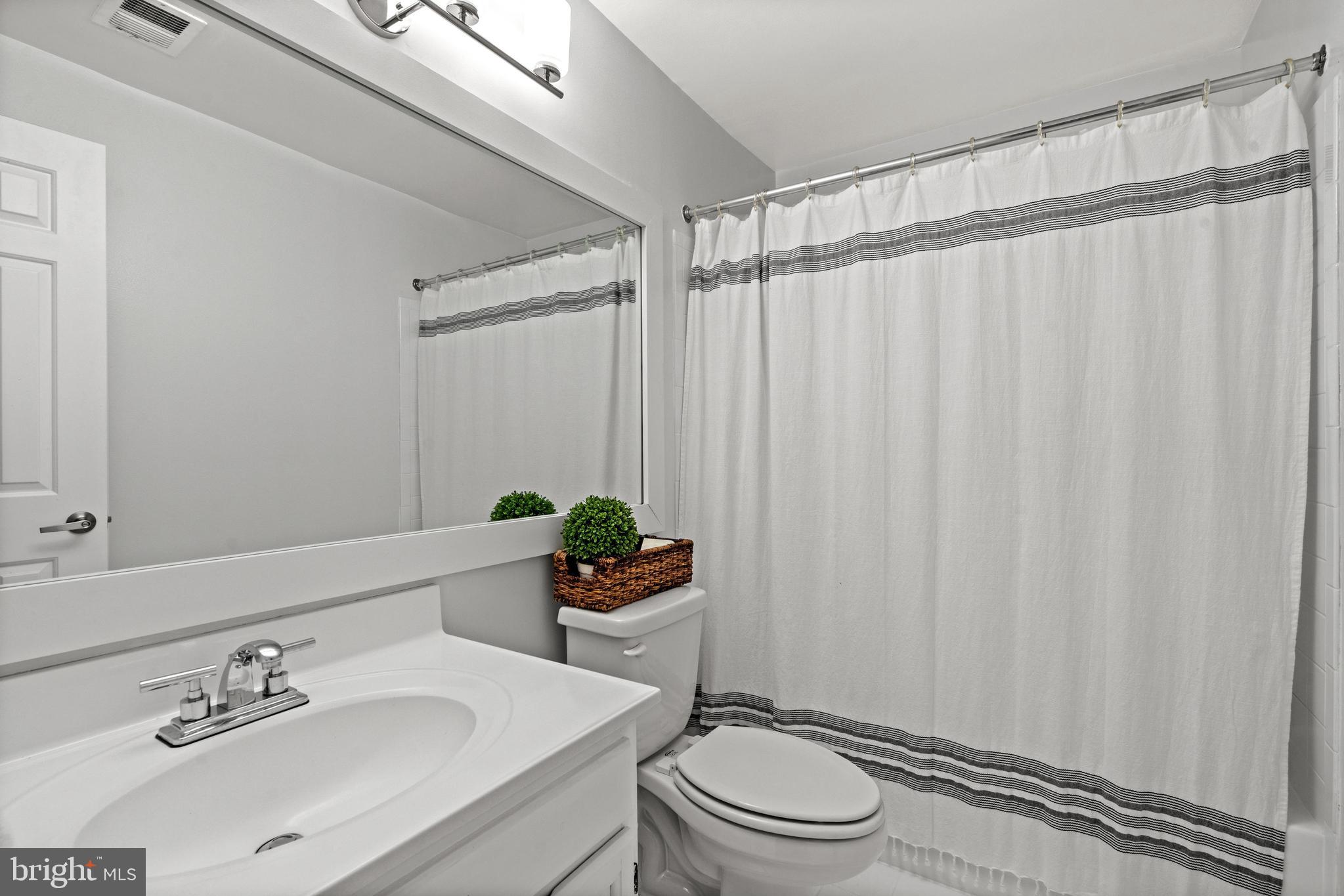 1796 Duffield Lane Alexandria, VA 22307 - Photo 34 of 42 a bathroom with a sink toilet and shower