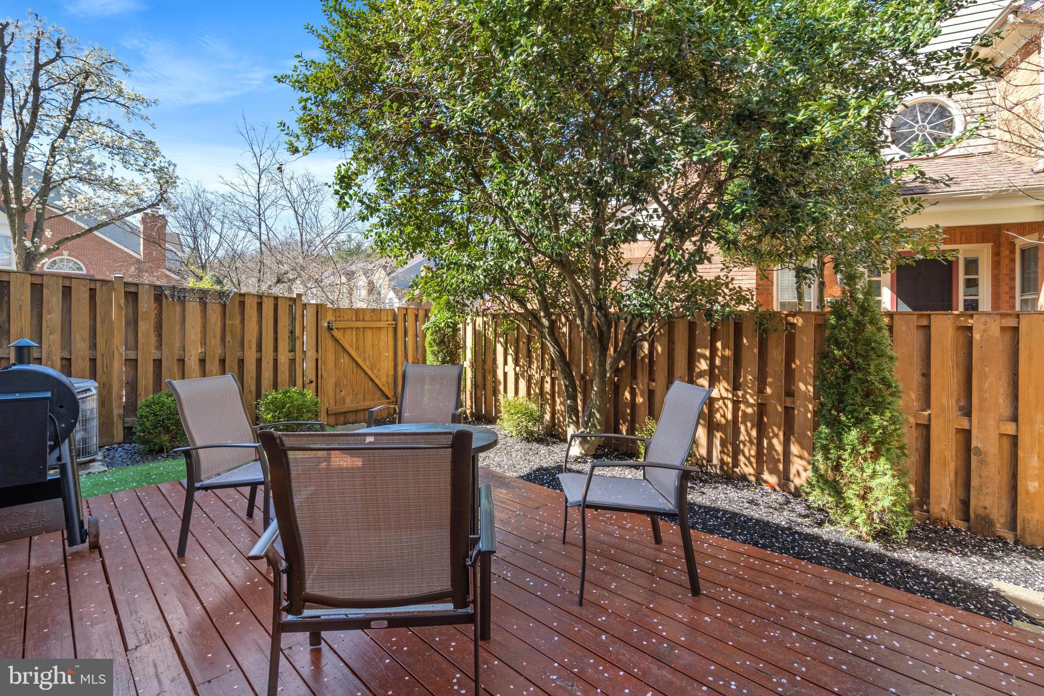 1796 Duffield Lane Alexandria, VA 22307 - Photo 36 of 42 a view of a chairs on the deck in front of house