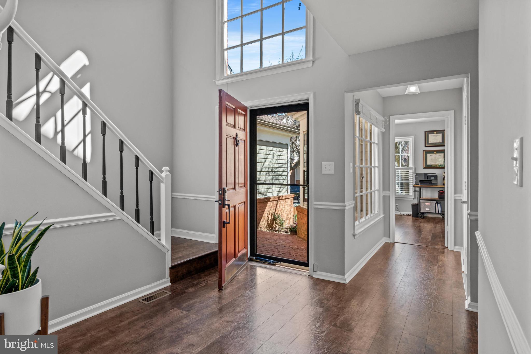 1796 Duffield Lane Alexandria, VA 22307 - Photo 4 of 42 a view of an entryway with wooden floor and stairs