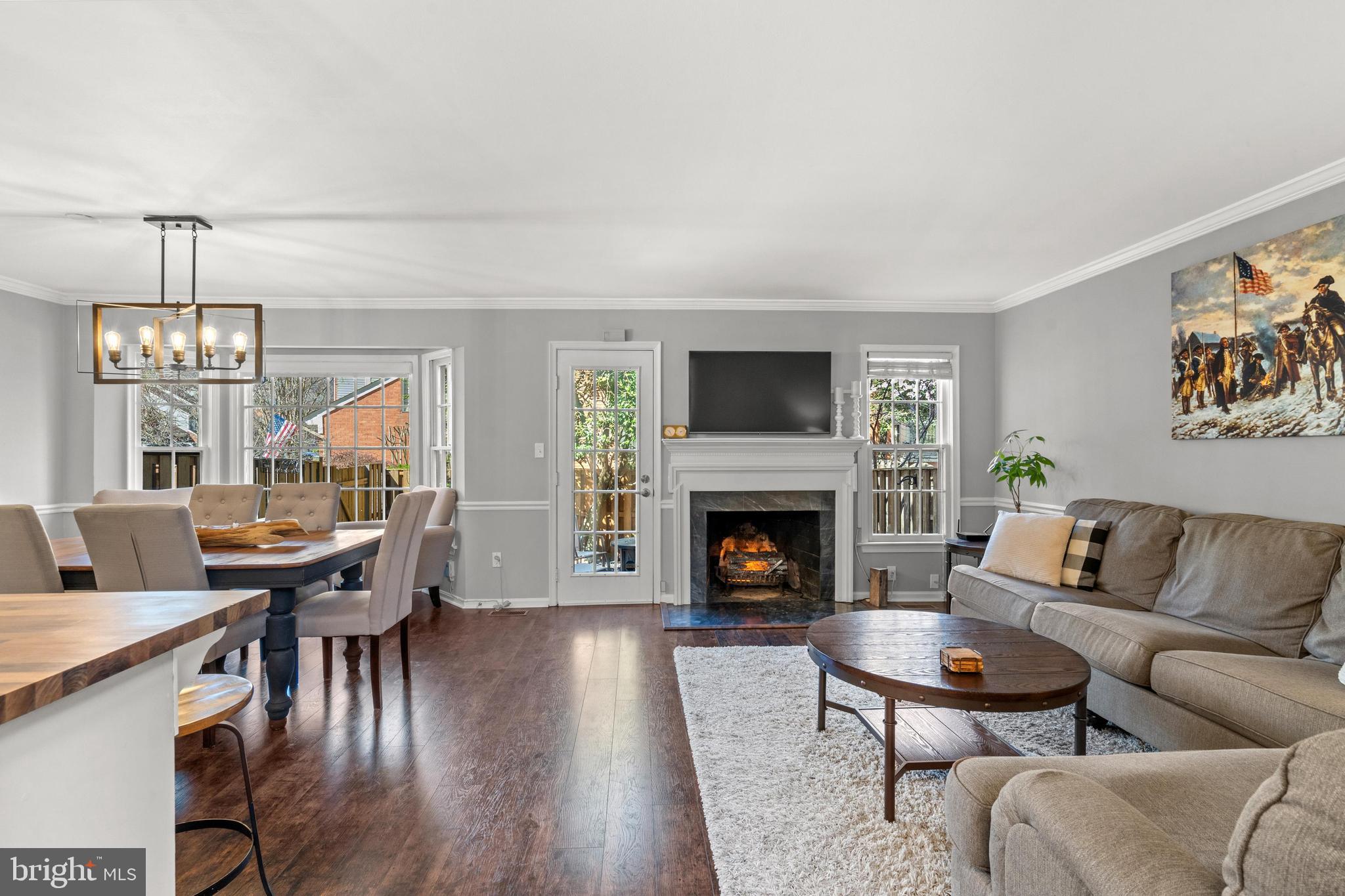 1796 Duffield Lane Alexandria, VA 22307 - Photo 8 of 42 a living room with furniture and a fireplace