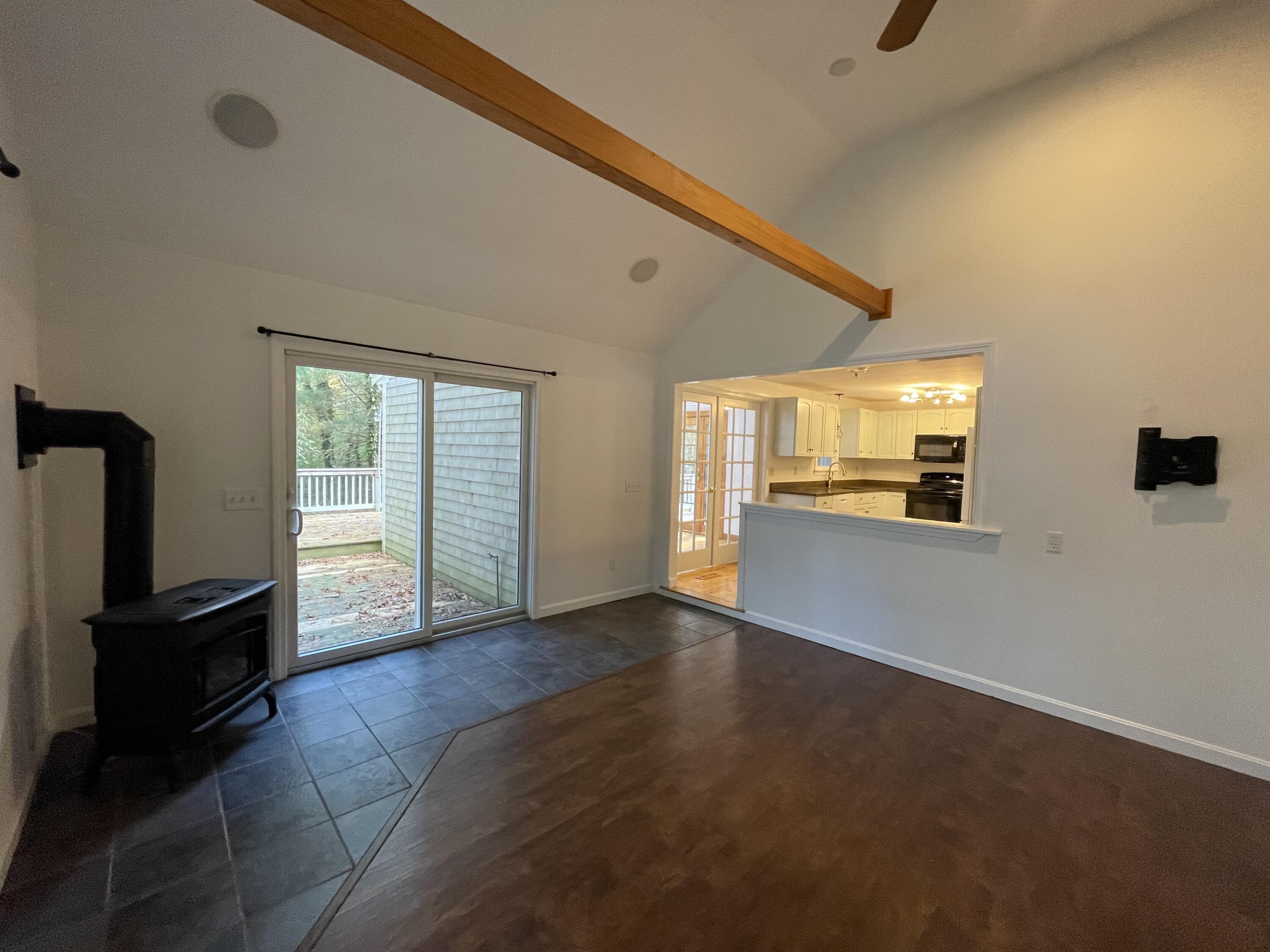 18 Sandy Valley Road Marstons Mills, MA 02648 - Photo 8 of 12 a view of empty room with wooden floor and fan