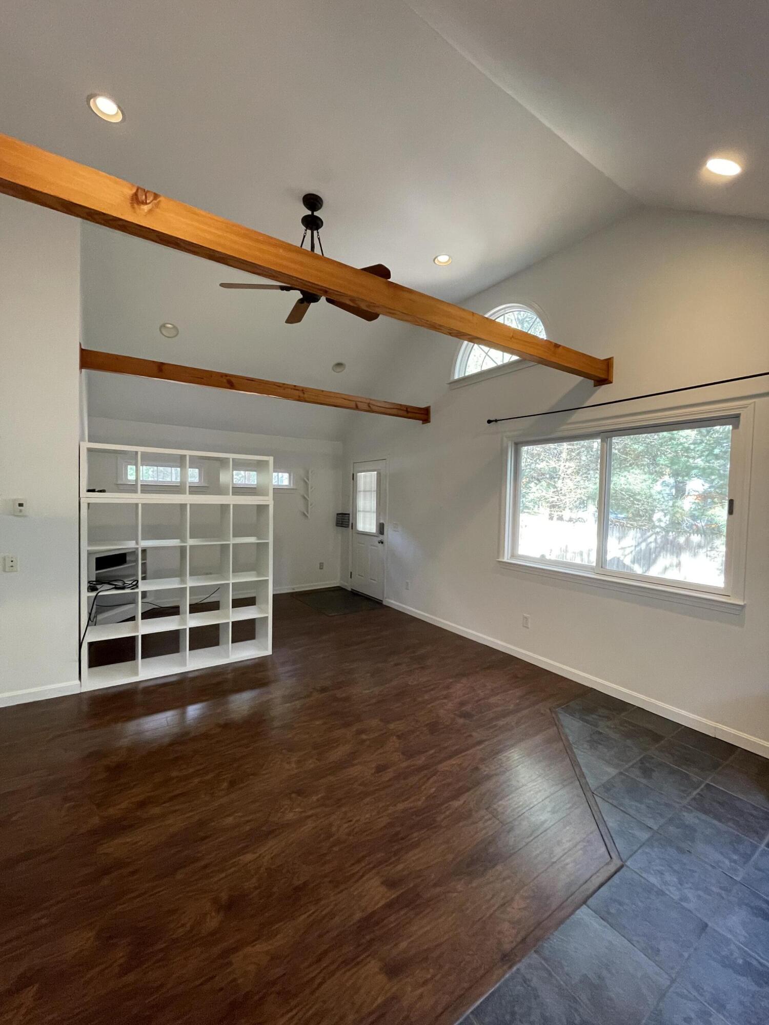 18 Sandy Valley Road Marstons Mills, MA 02648 - Photo 9 of 12 an empty room with wooden floor and windows