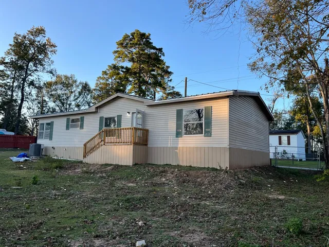 a house view with a outdoor space
