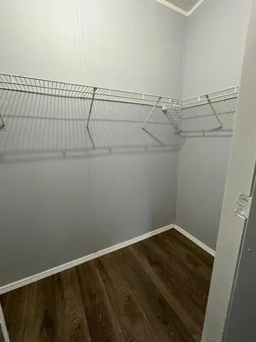 a view of a room with racks on the wall