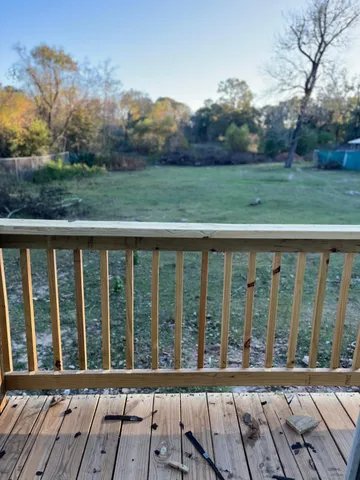a view of a wooden roof deck