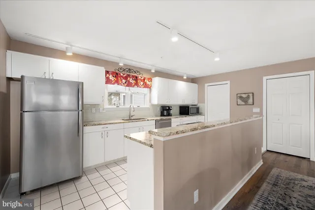 a dining room with furniture window wooden floor