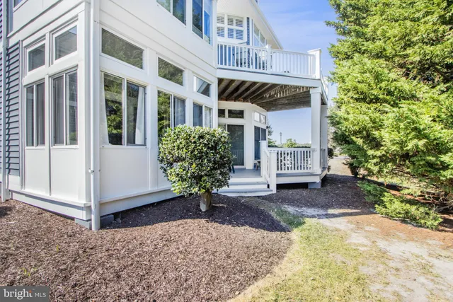 a view of a lake with a yard