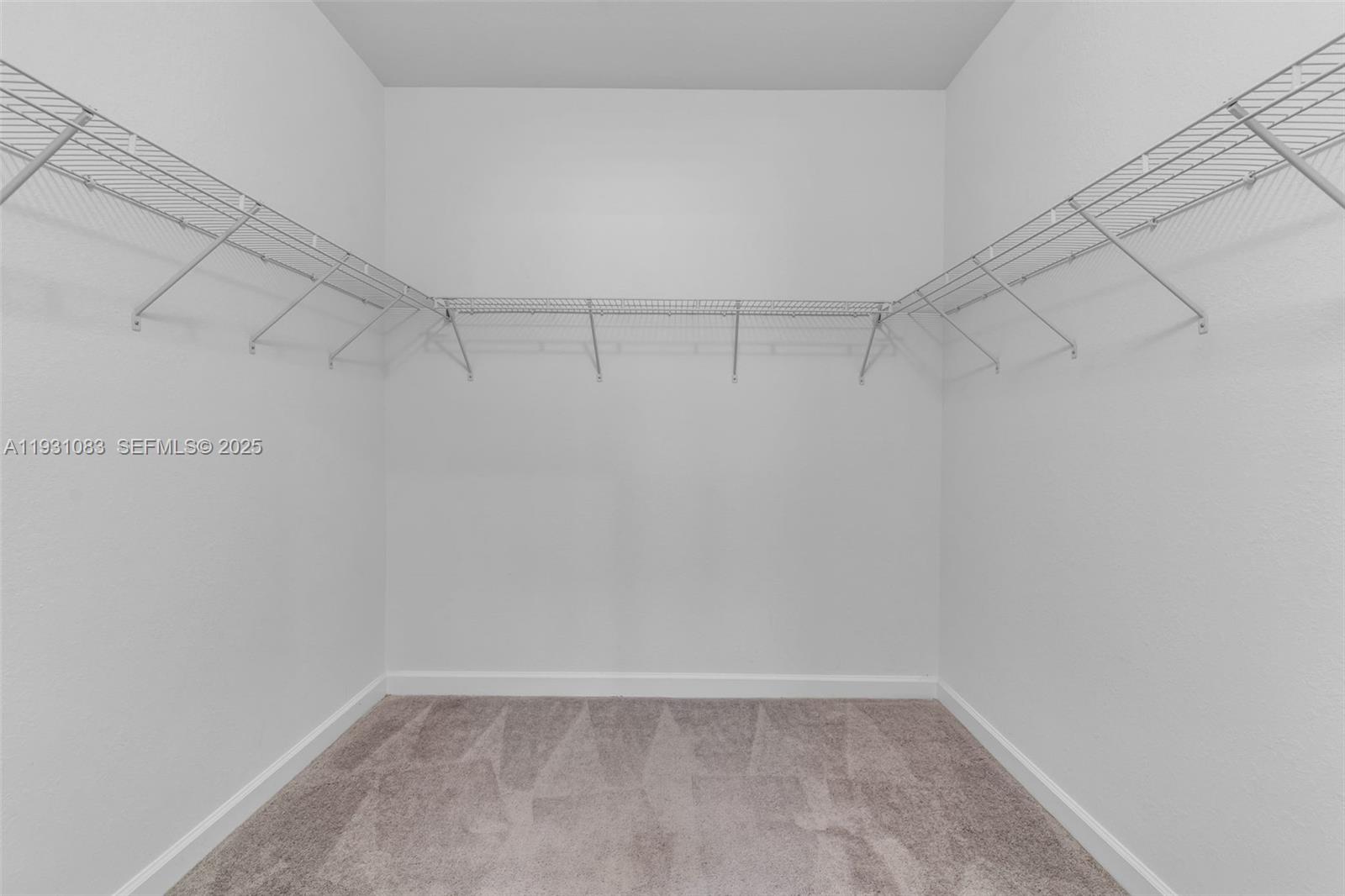 28625 Southwest 133rd Place Homestead, FL 33033 - Photo 13 of 21 a view of a room with racks on the wall