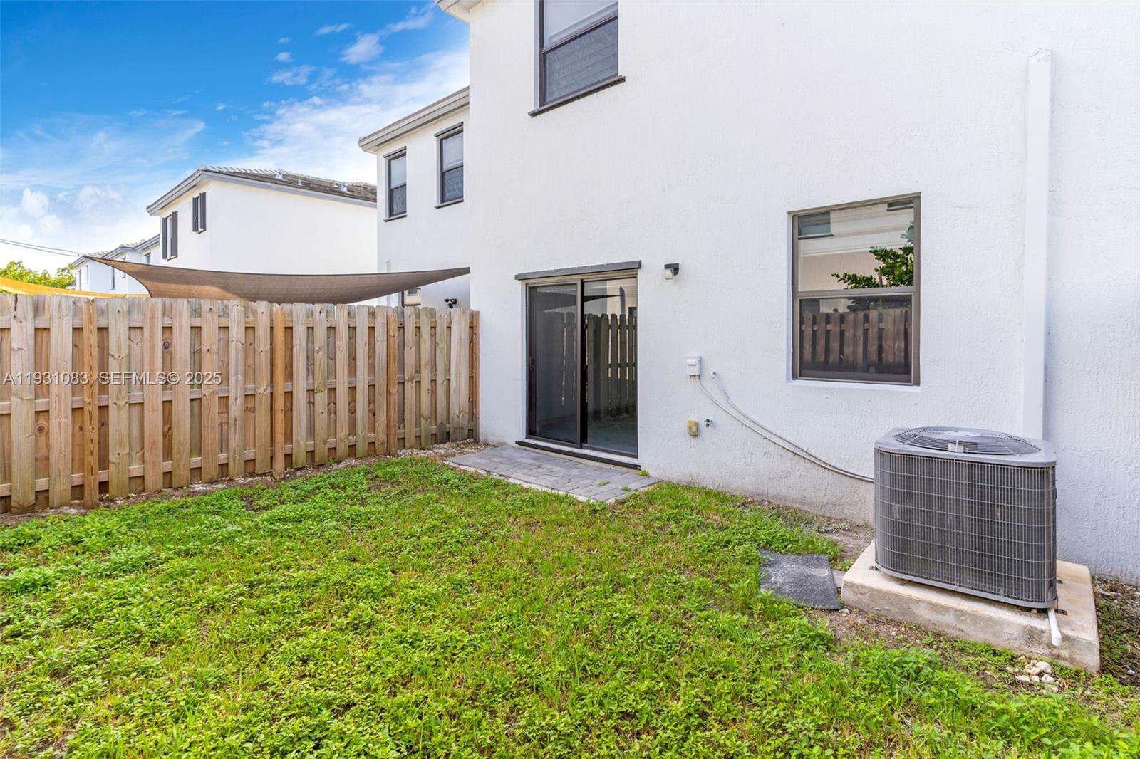 28625 Southwest 133rd Place Homestead, FL 33033 - Photo 17 of 21 a front view of a house with a garden