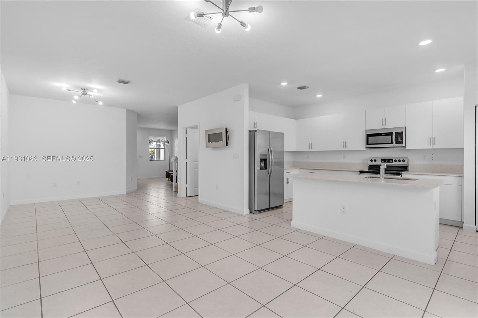 28625 Southwest 133rd Place Homestead, FL 33033 - Photo 3 of 21 a view of a kitchen with electric appliances