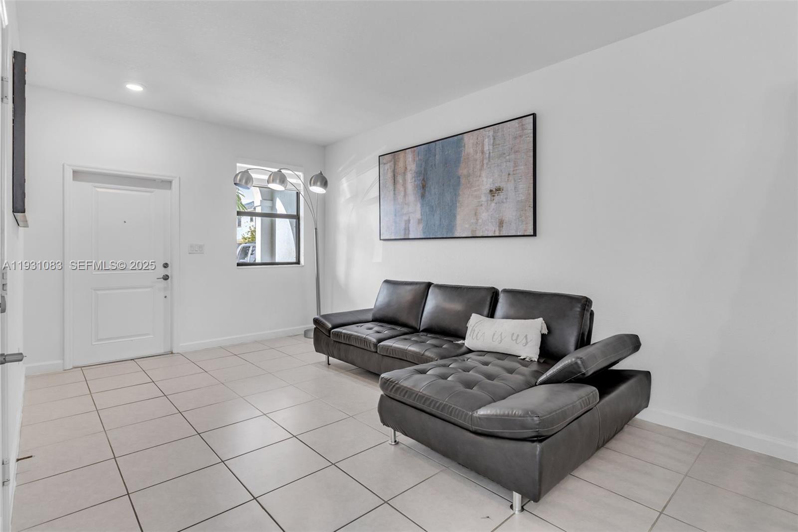 28625 Southwest 133rd Place Homestead, FL 33033 - Photo 6 of 21 a living room with furniture and window