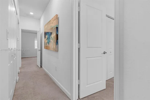 a view of a hallway with elevator