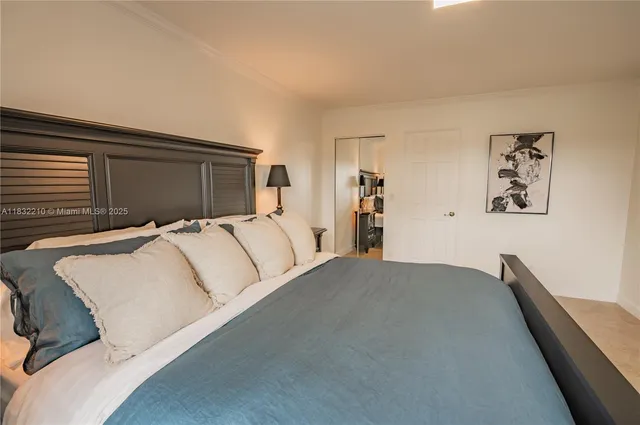 a bed room with a bed and a couch