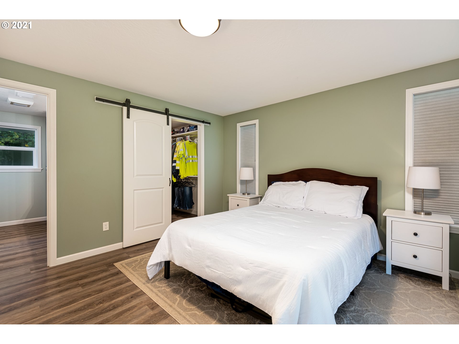 38436 Kickbusch Lane Springfield, OR 97478 - Photo 14 of 32 a bedroom with a bed and wooden floor