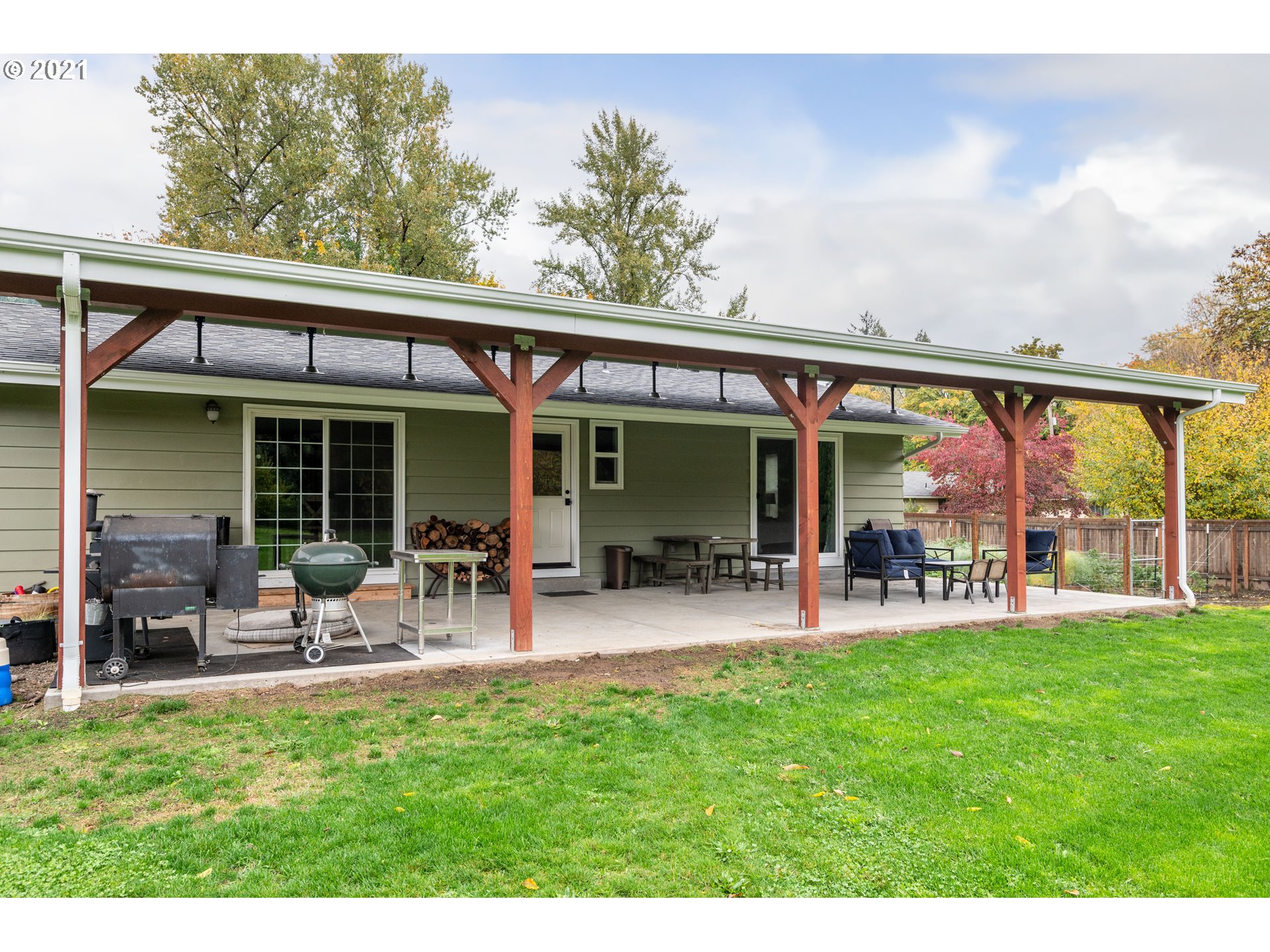 38436 Kickbusch Lane Springfield, OR 97478 - Photo 22 of 32 a view of a house with a yard patio and furniture