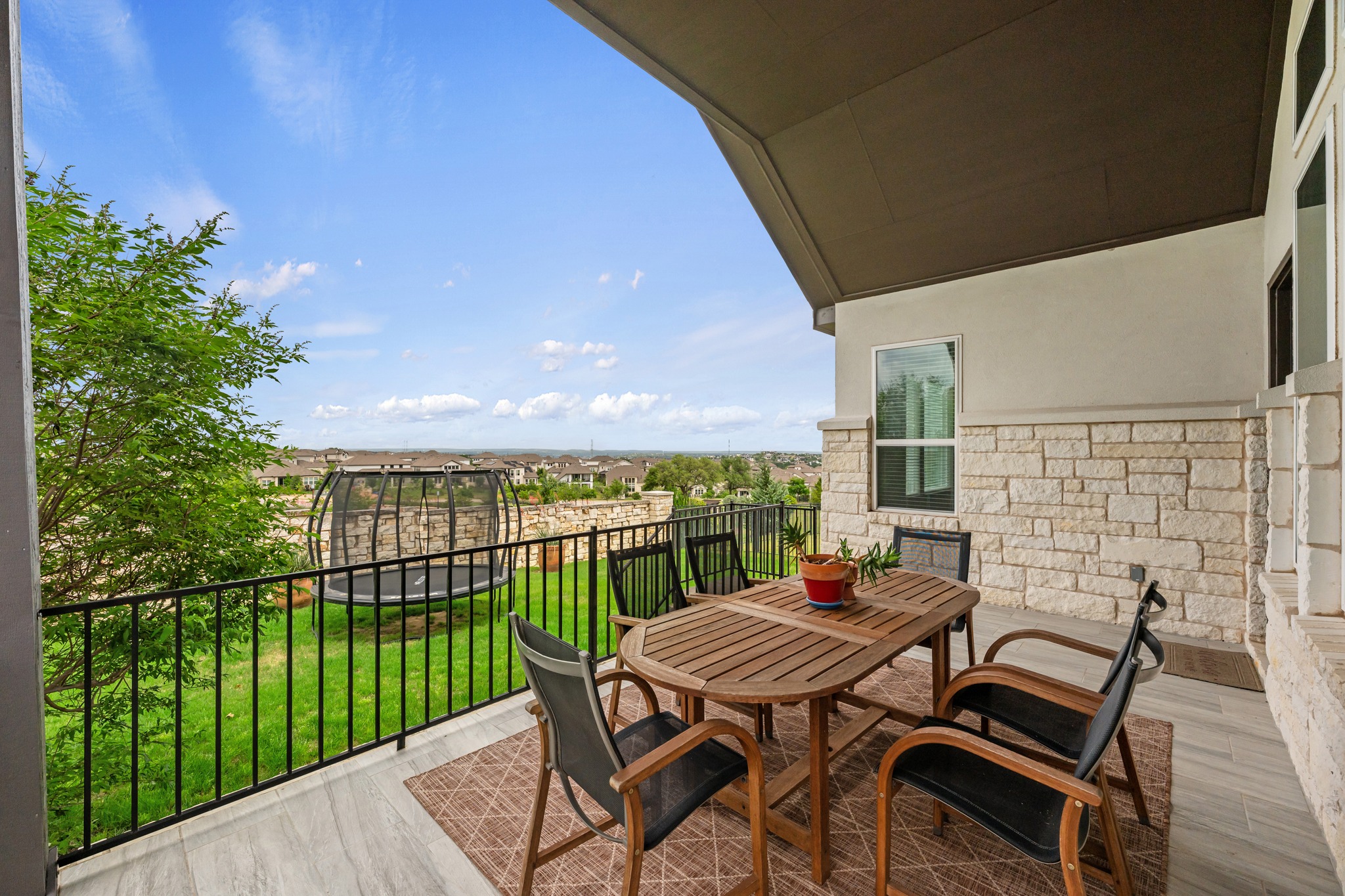 510 Elworth Path Austin, TX 78738 - Photo 26 of 40 a view of a roof deck with furniture