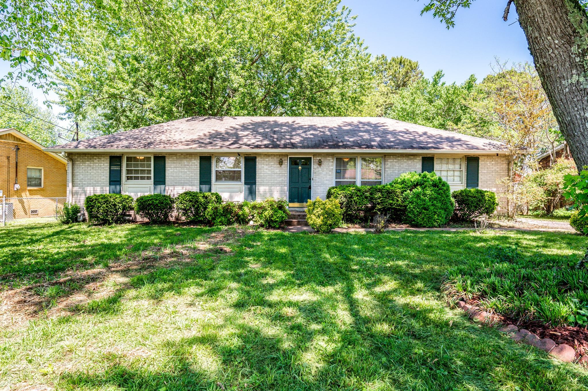 a house view with a garden space