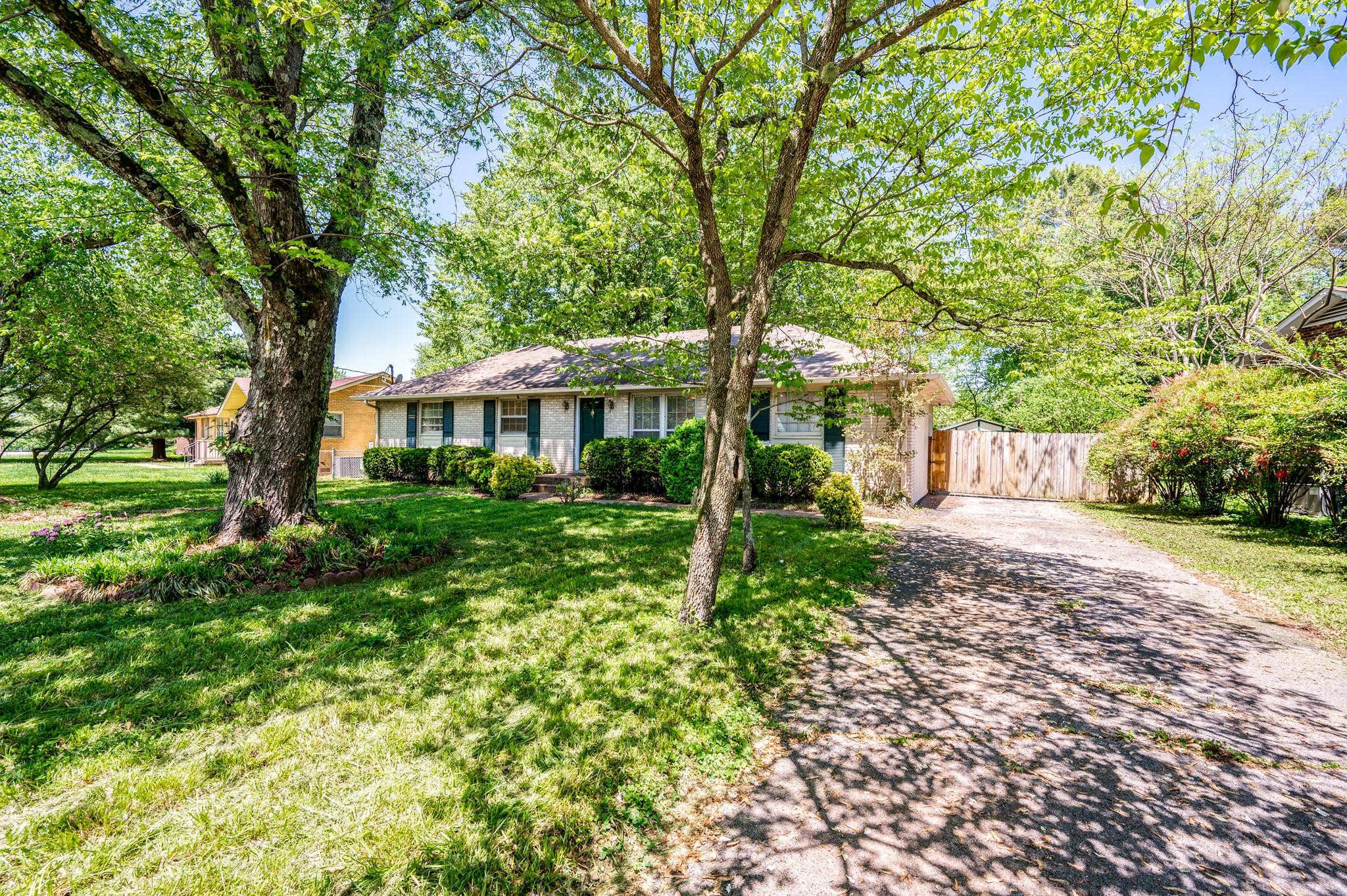 311 Santa Rosa Drive Old Hickory, TN 37138 - Photo 2 of 19 a front view of a house with a yard and trees