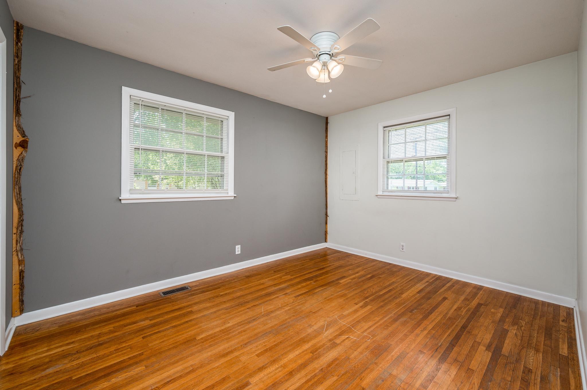 311 Santa Rosa Drive Old Hickory, TN 37138 - Photo 11 of 19 a view of an empty room with wooden floor and a window