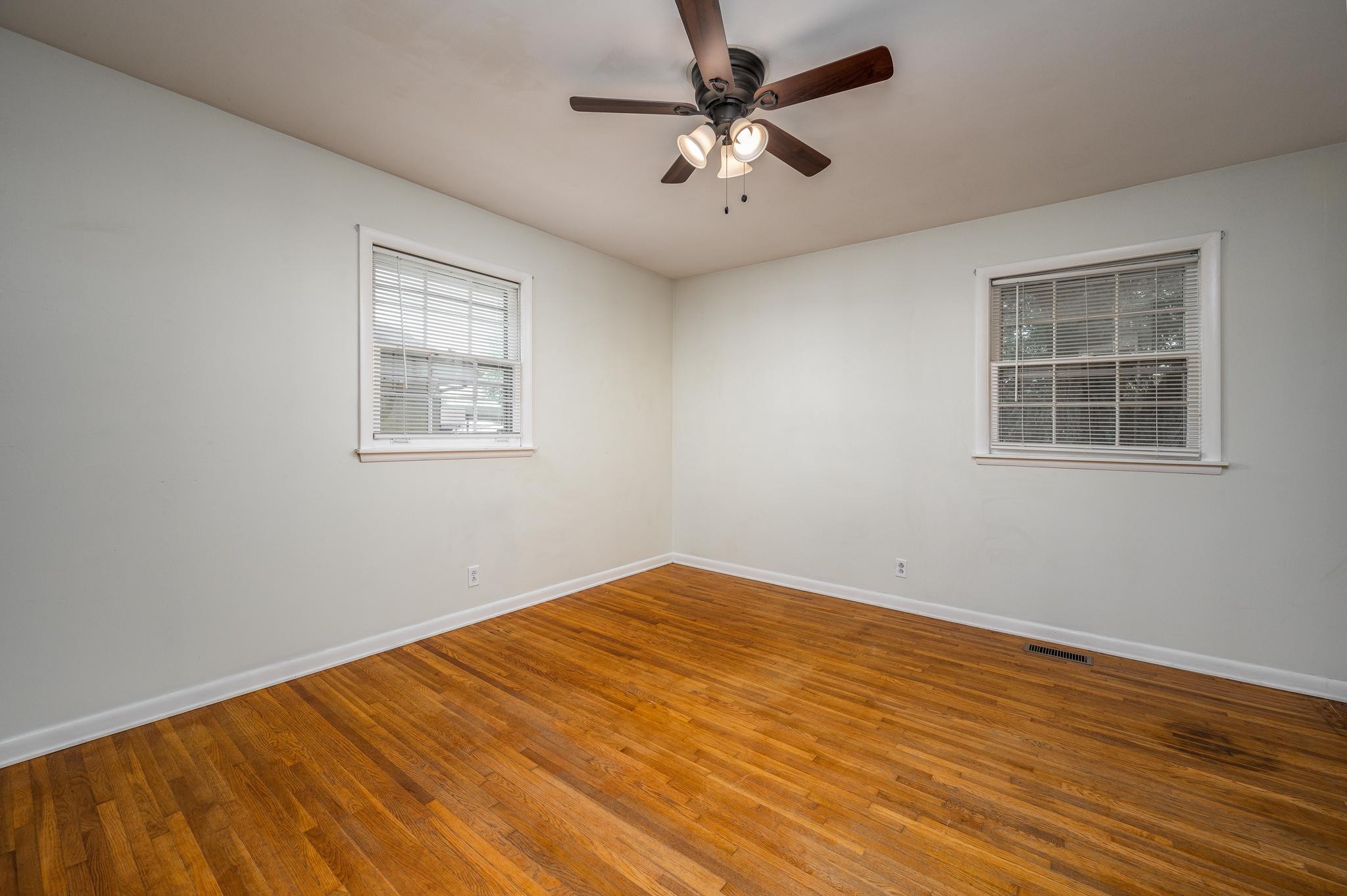 311 Santa Rosa Drive Old Hickory, TN 37138 - Photo 12 of 19 a view of empty room with wooden floor and fan
