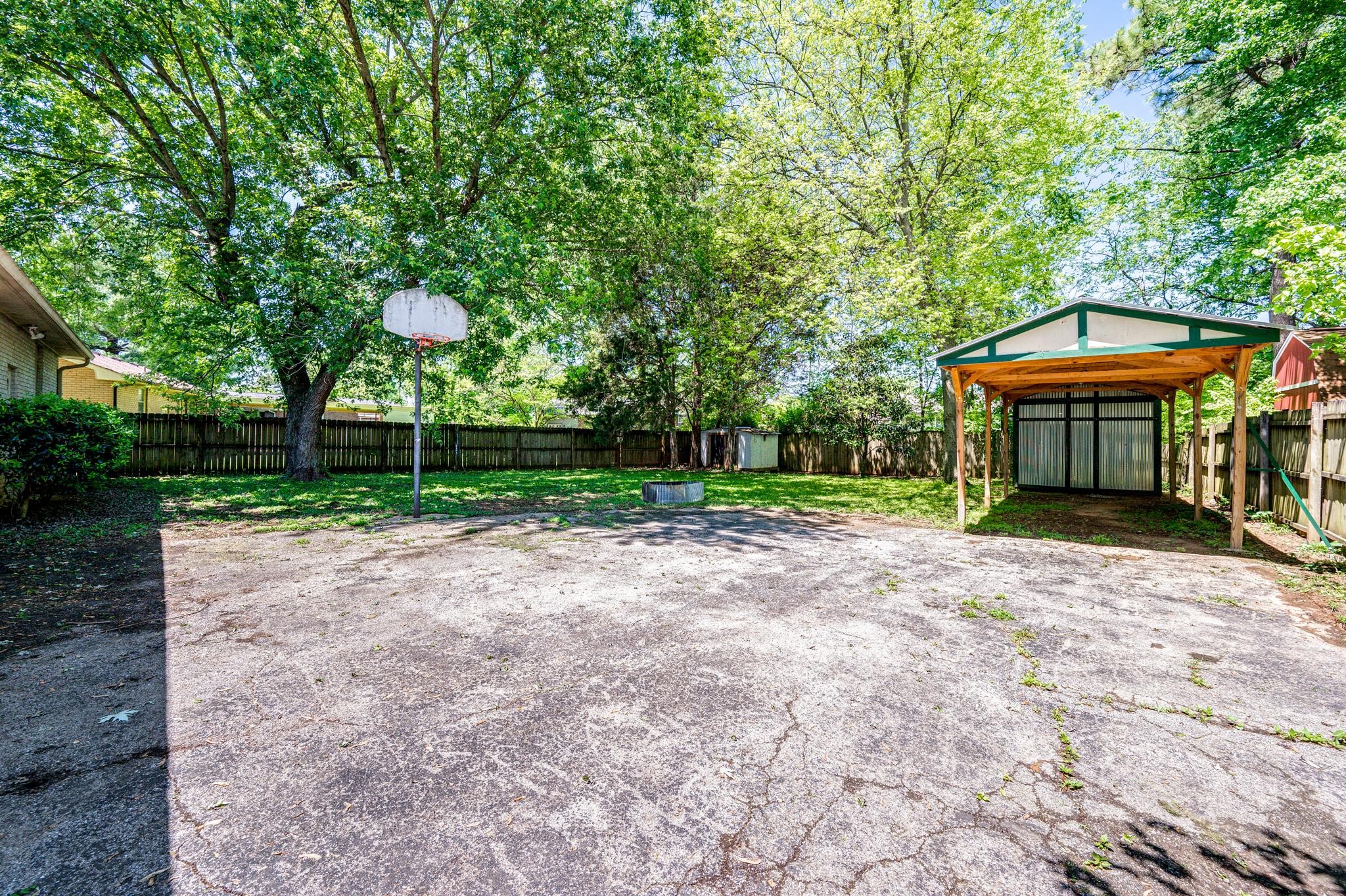 311 Santa Rosa Drive Old Hickory, TN 37138 - Photo 17 of 19 a view of a house with backyard and a tree