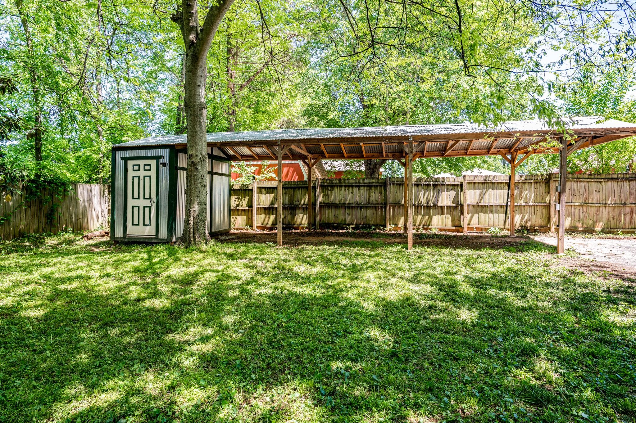 311 Santa Rosa Drive Old Hickory, TN 37138 - Photo 18 of 19 a view of a backyard with a large tree