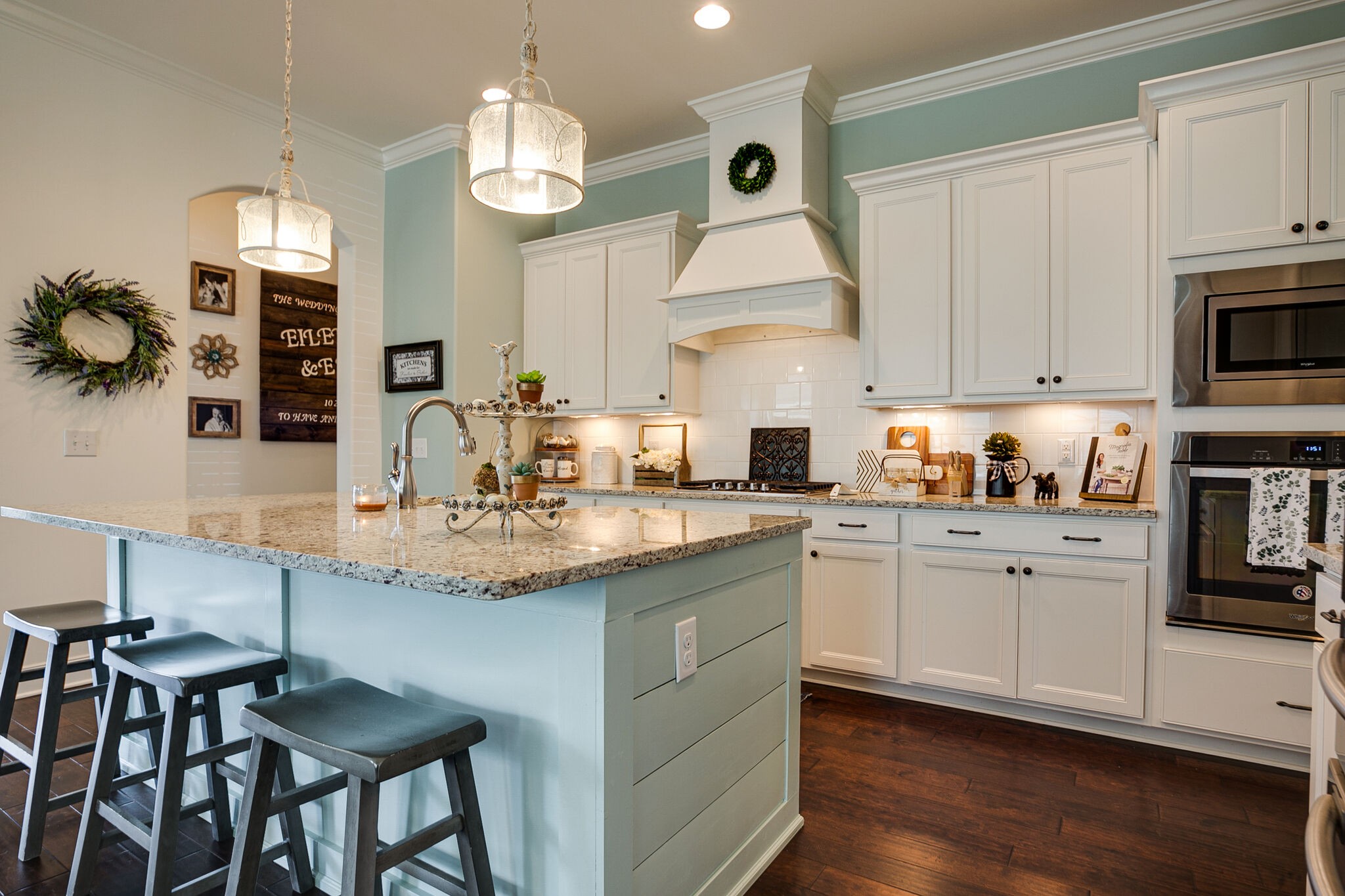 1146 Batbriar Road Murfreesboro, TN 37128 - Photo 14 of 43 a kitchen with granite countertop white cabinets and appliances