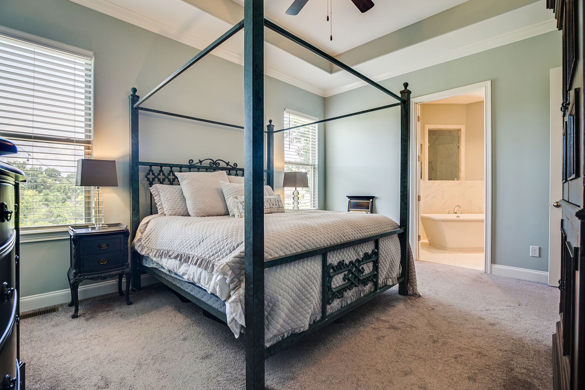 1146 Batbriar Road Murfreesboro, TN 37128 - Photo 22 of 43 a large bed sitting in a bedroom next to a window