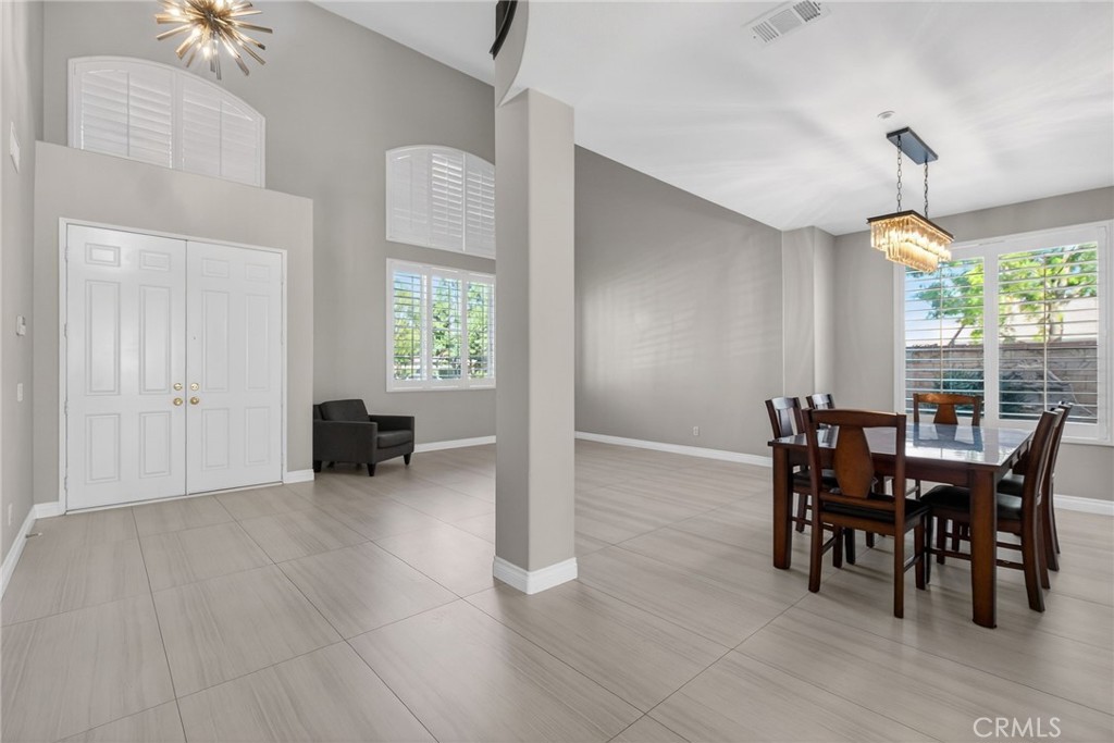 11552 Brookrun Court Riverside, CA 92505 - Photo 8 of 71 a view of a dining room with furniture and window