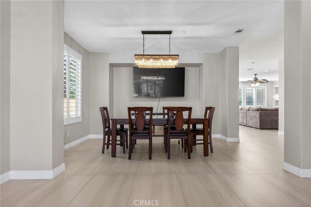 11552 Brookrun Court Riverside, CA 92505 - Photo 9 of 71 a view of a dining room with furniture