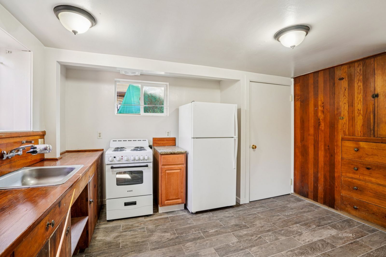 53451 Middleridge Drive Idyllwild, CA 92549 - Photo 12 of 30 a kitchen with stainless steel appliances granite countertop a refrigerator a stove a sink and a cabinets