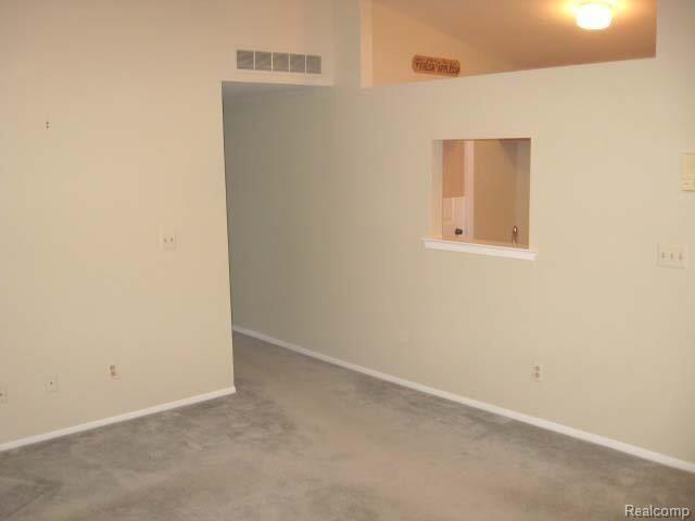 60 Pine Tree Ridge, Unit 4 Waterford, MI 48327 - Photo 9 of 9 Pine Tree Ridge Living Room 2