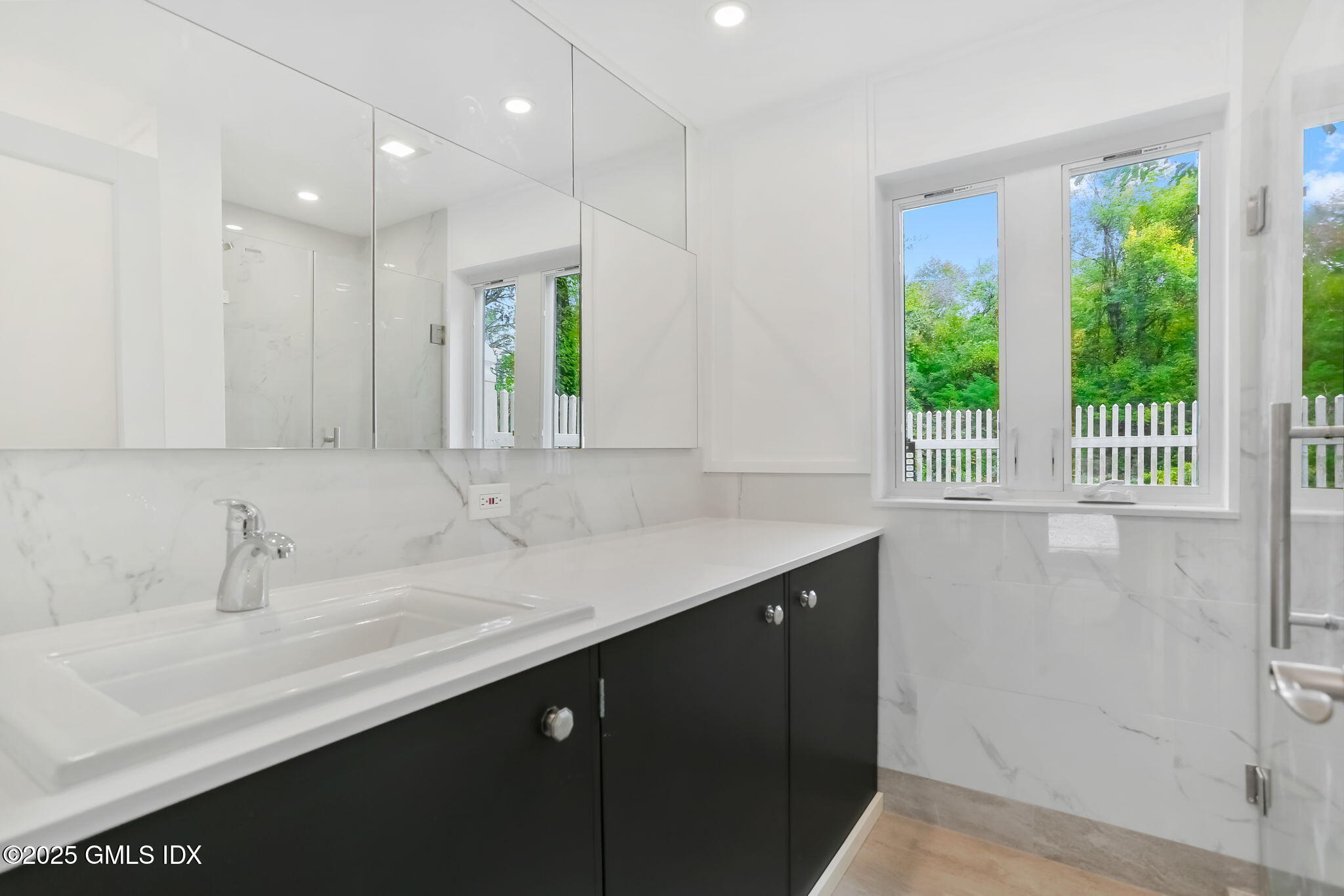 527 Stanwich Road, Unit COTTAGE Greenwich, CT 06831 - Photo 7 of 18 a kitchen with a sink and a window