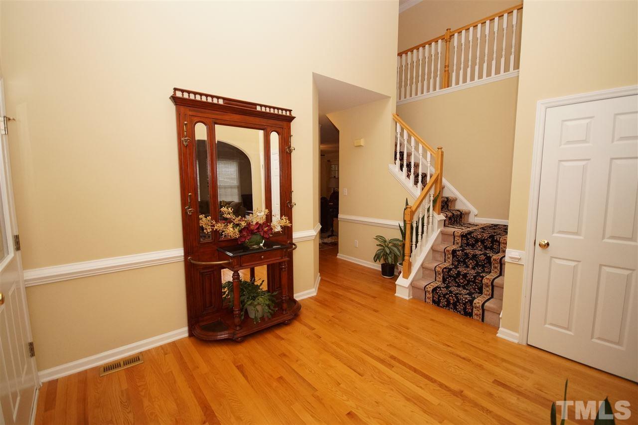 7908 Broad Street Raleigh, NC 27613 - Photo 2 of 24 a view of a entryway door with wooden floor