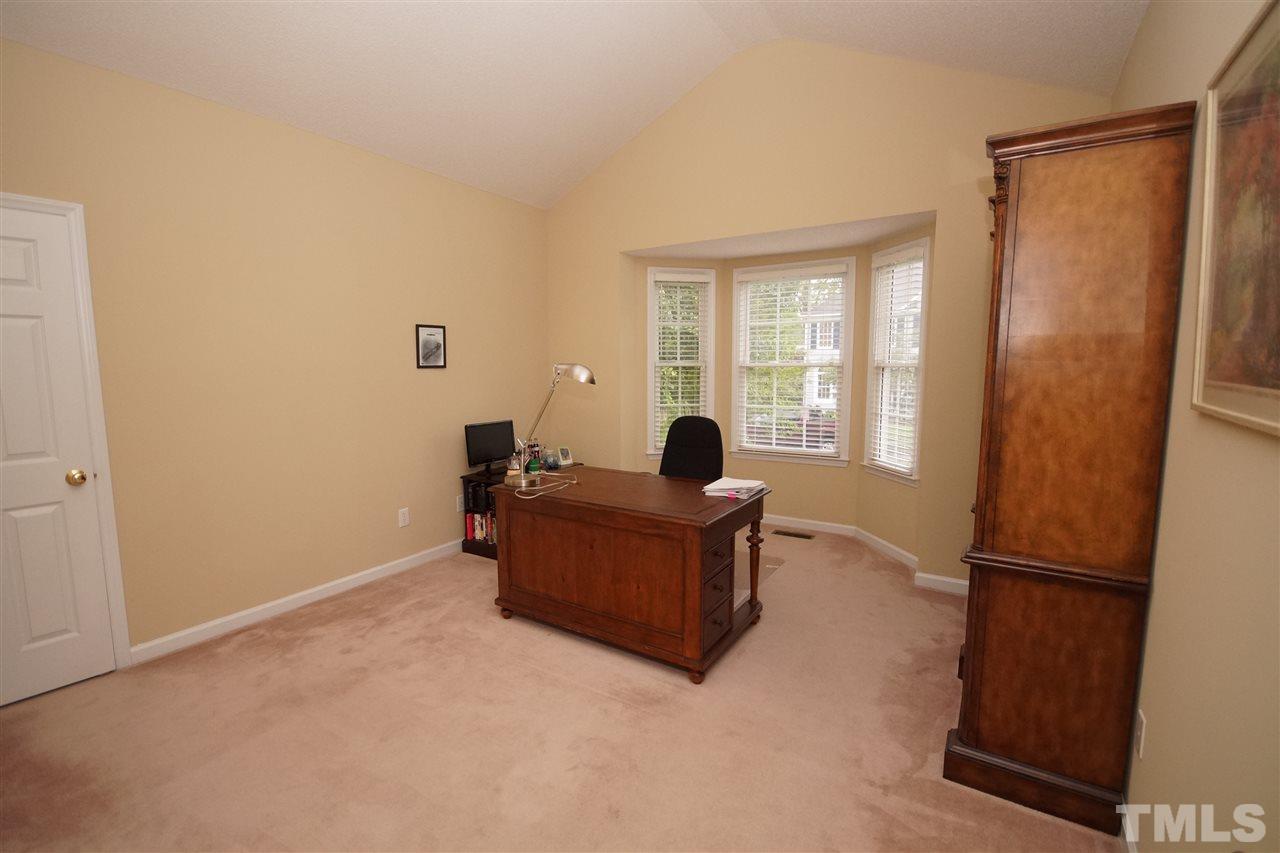 7908 Broad Street Raleigh, NC 27613 - Photo 11 of 24 a living room with furniture and a window