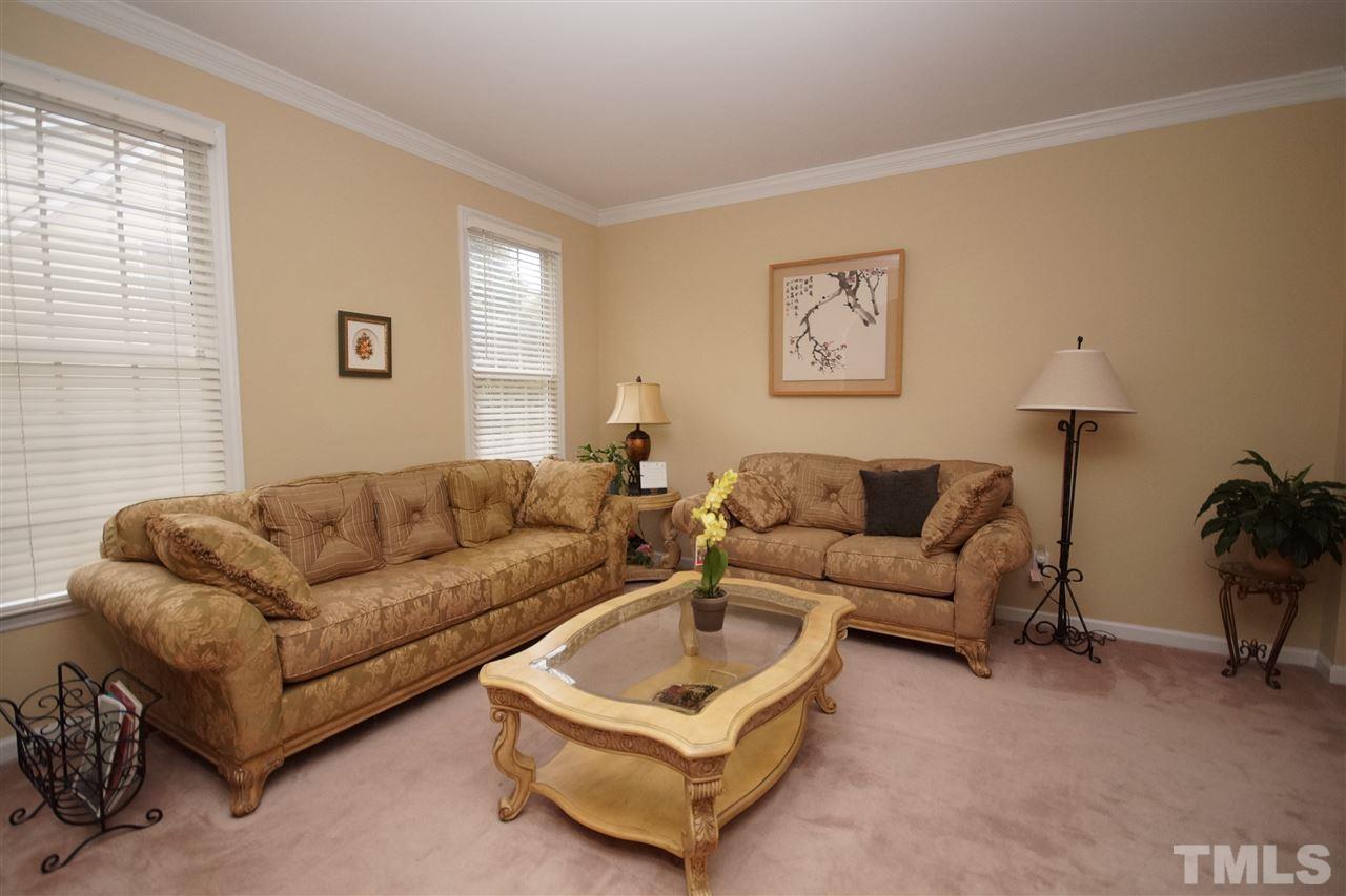 7908 Broad Street Raleigh, NC 27613 - Photo 3 of 24 a living room with furniture and a window