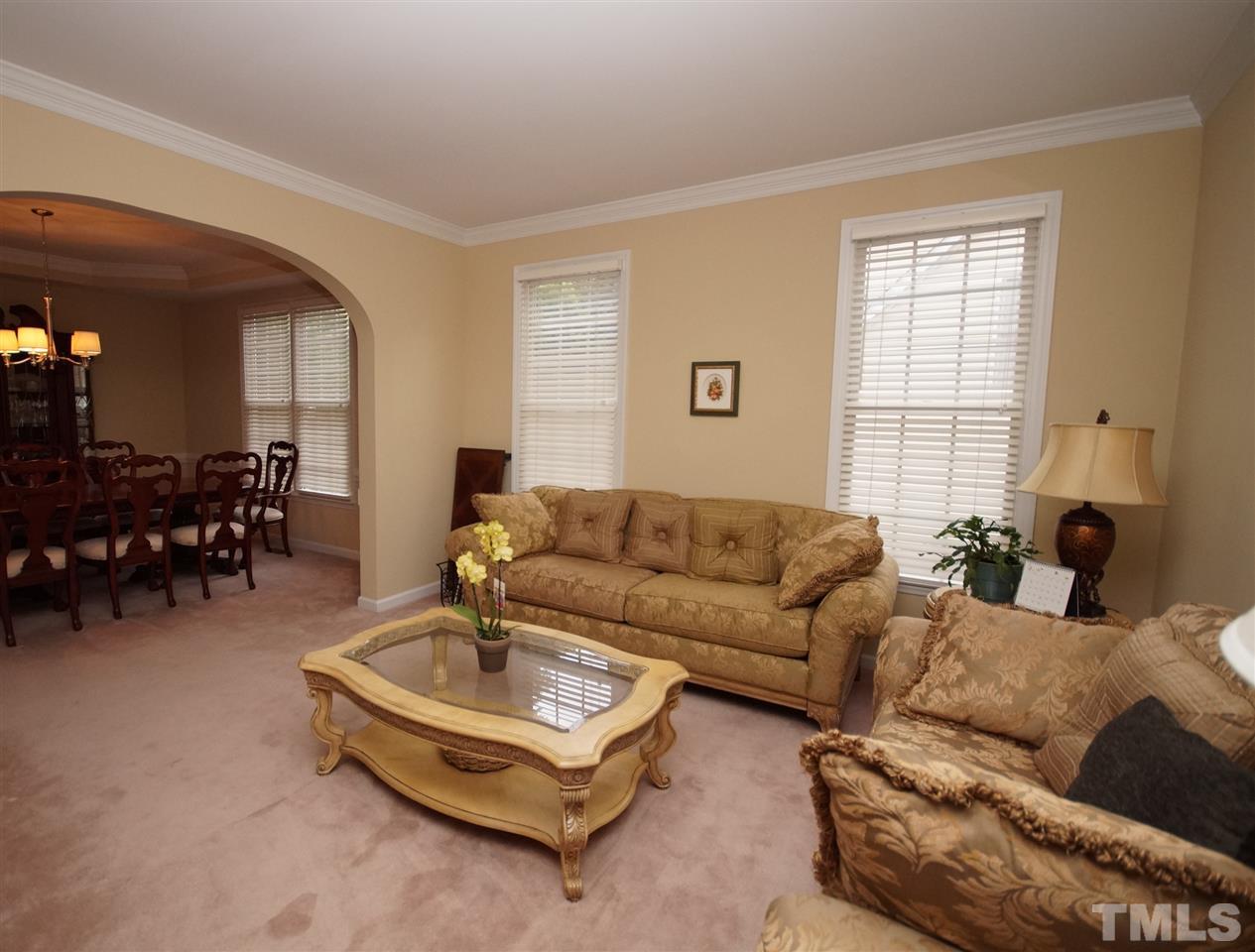 7908 Broad Street Raleigh, NC 27613 - Photo 4 of 24 a living room with furniture and a window