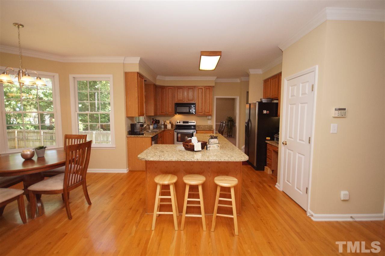 7908 Broad Street Raleigh, NC 27613 - Photo 6 of 24 a view of a dining room with furniture window and outside view