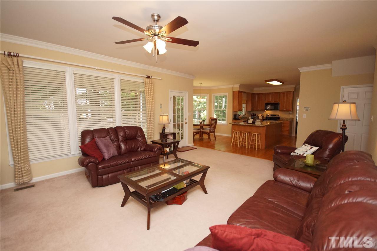 7908 Broad Street Raleigh, NC 27613 - Photo 10 of 24 a living room with furniture and a large window