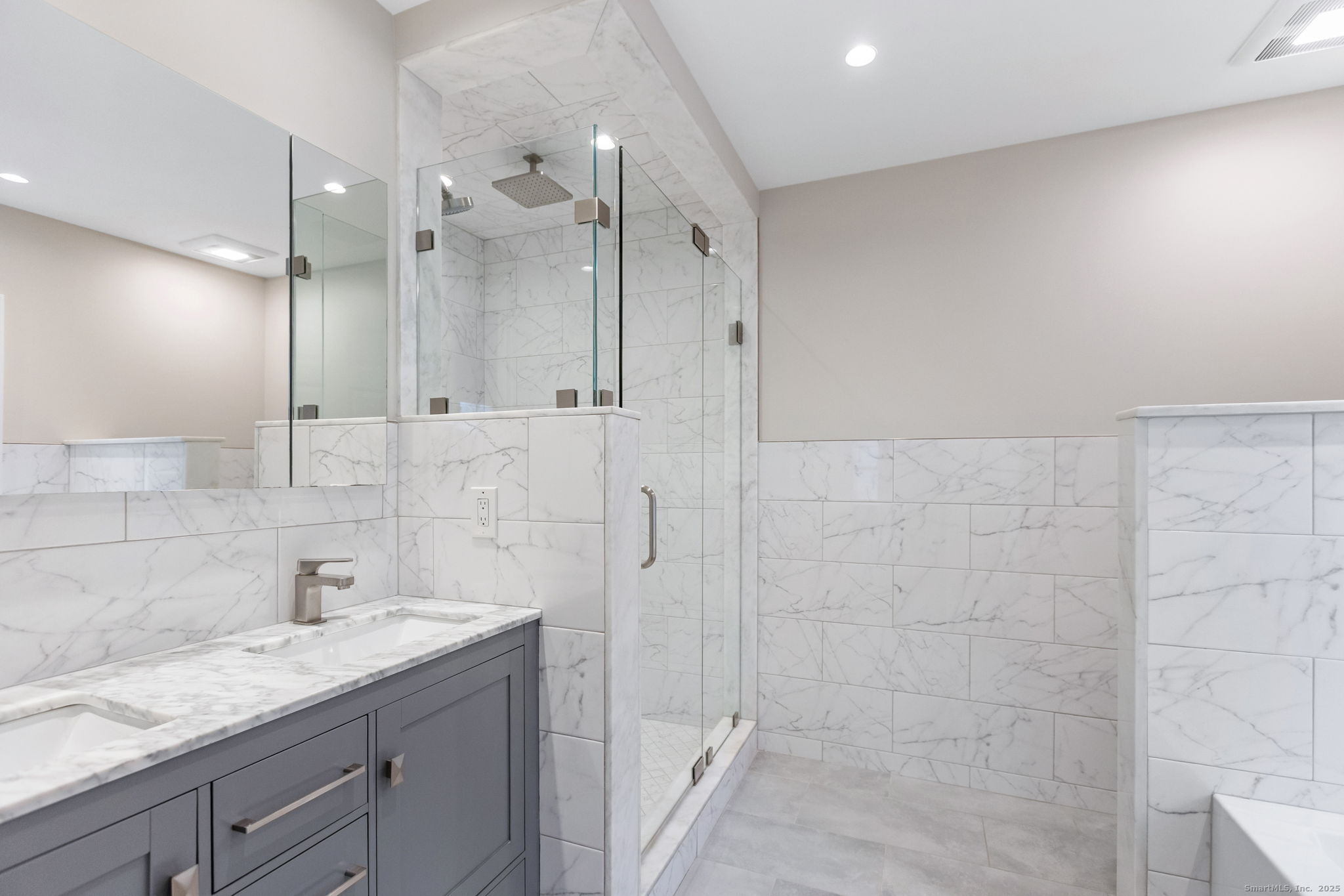 160 Glenbrook Road, Unit 3D Stamford, CT 06902 - Photo 13 of 26 a bathroom with a granite countertop sink a shower and a mirror