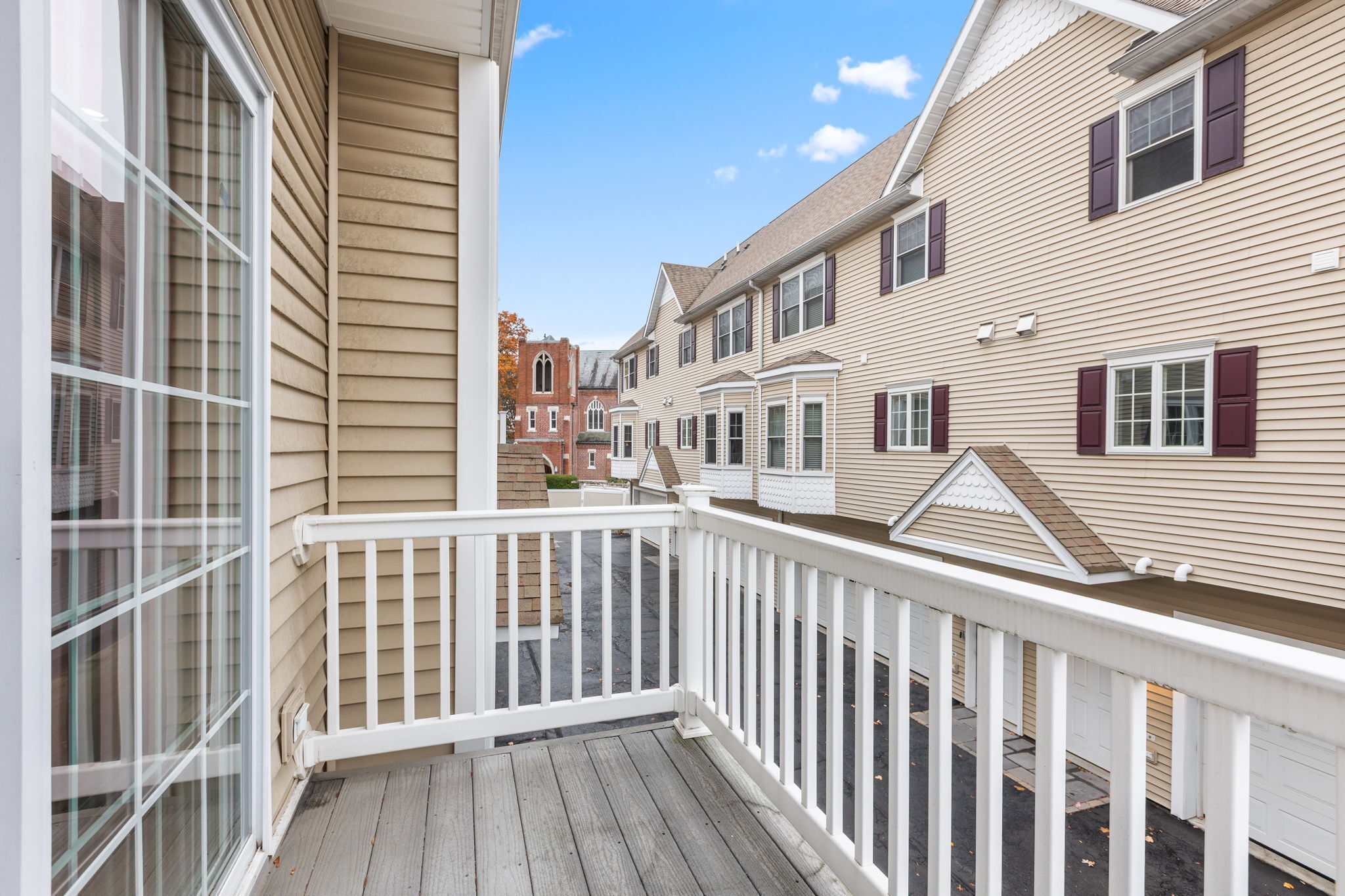 160 Glenbrook Road, Unit 3D Stamford, CT 06902 - Photo 22 of 26 a view of a brick building from a balcony