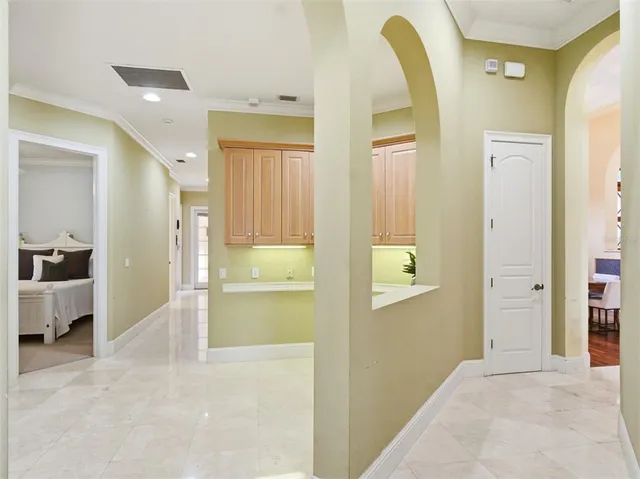 a view of a house with a cars park